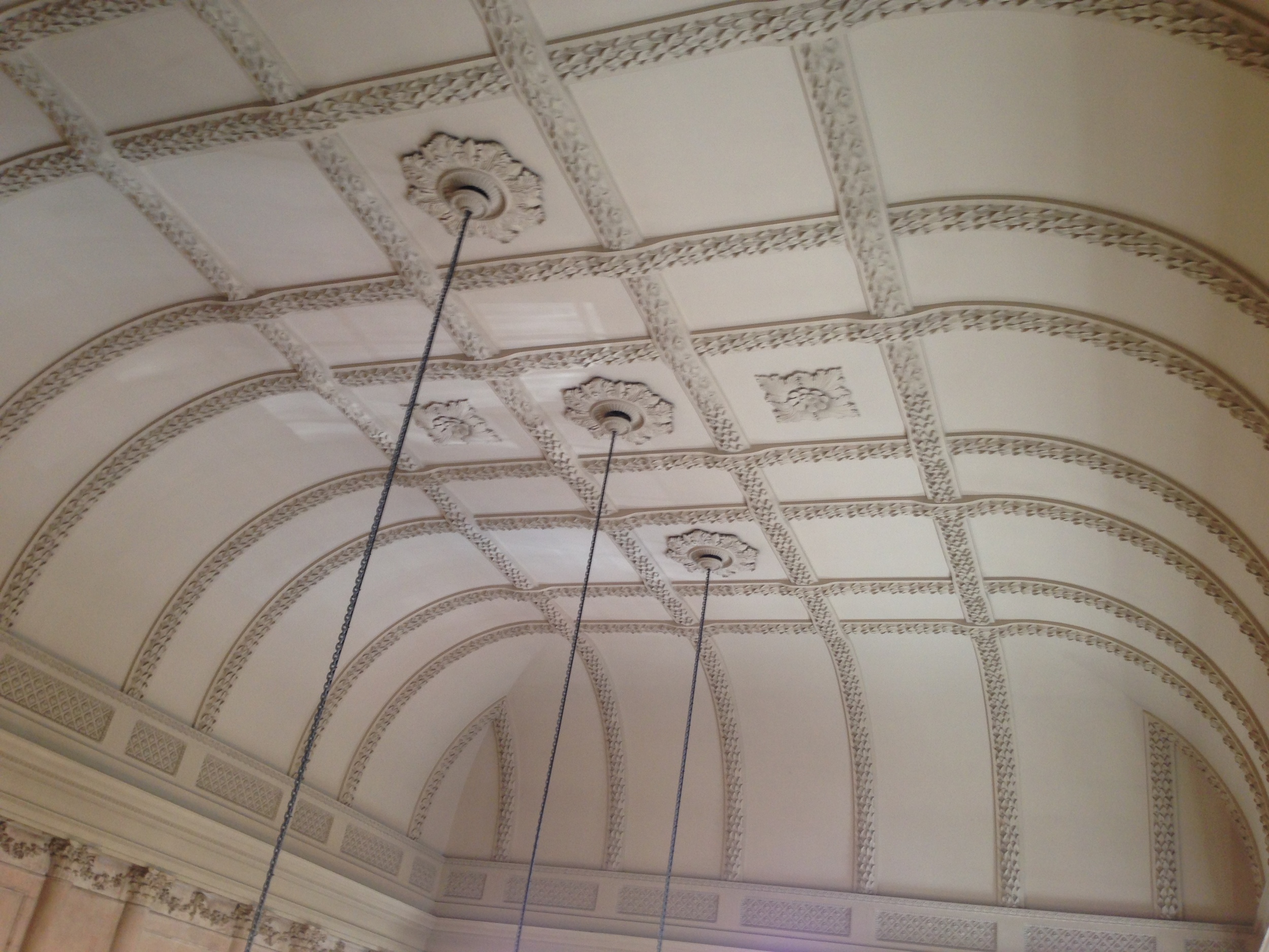  A nice shot of all of the intricate molding and details of the ceiling of one of the rooms. 