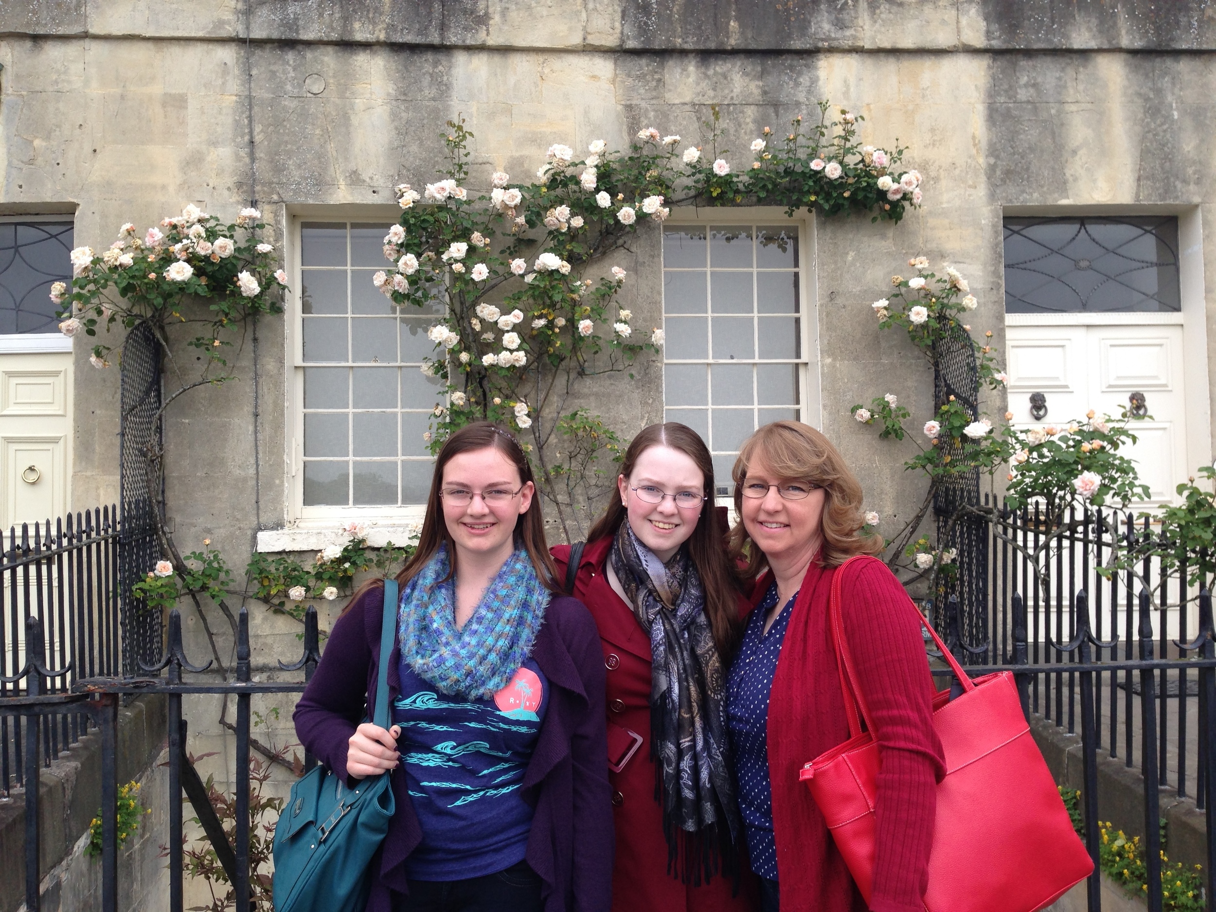  As in many parts of Britain, they have "build-downs" - basements built under the street level with courtyards in between the basement and the street. We are posing in front of one such building. 