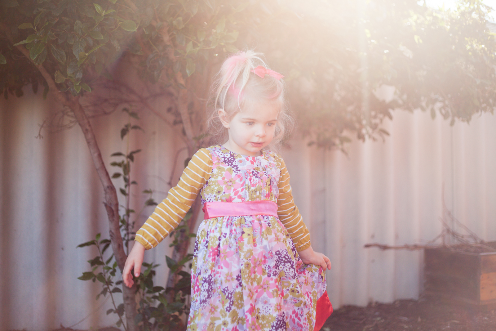 For the most part, you want to find a place around the house where the light that is hitting the subjects face is the same intensity as the light that is hitting their background. Having said that, have a play with placing your subject in front of the sun and shooting towards it.