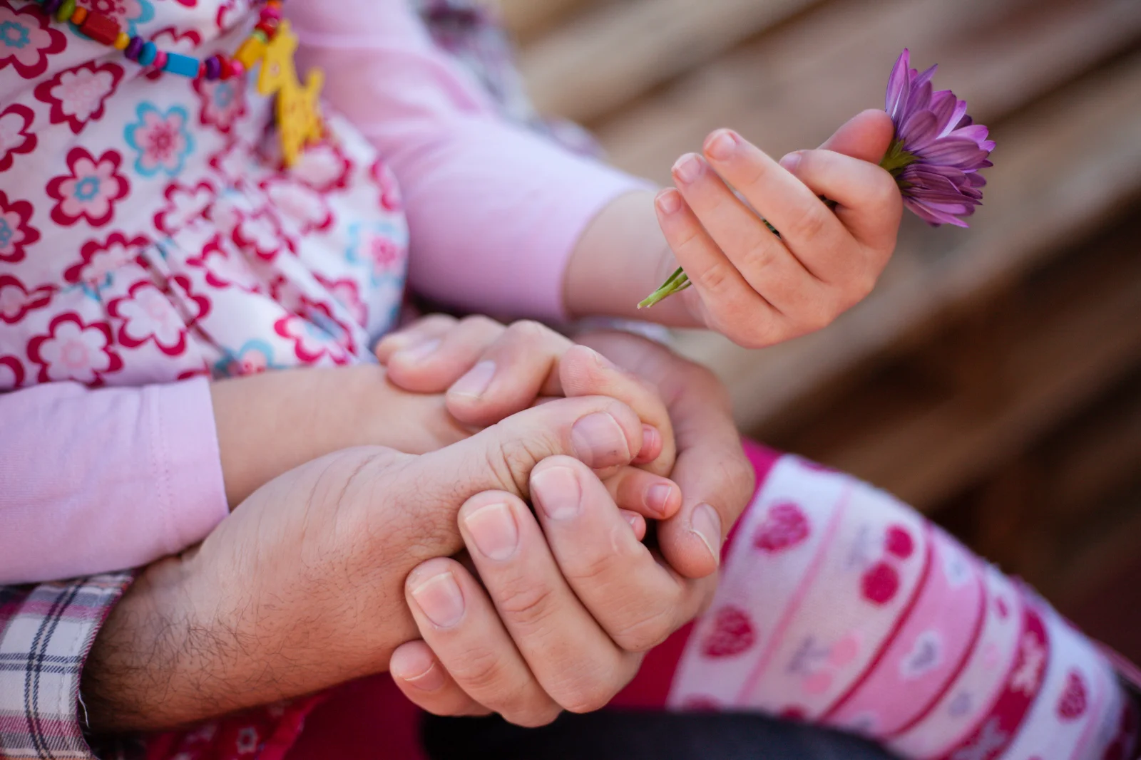 Don't be afraid to get really close to the subject, and to focus in on a single feature (like freckles on a nose, or eyelashes).  Set your f-stop at 4 or below and experiment.  The results make you feel like you are right in the moment.