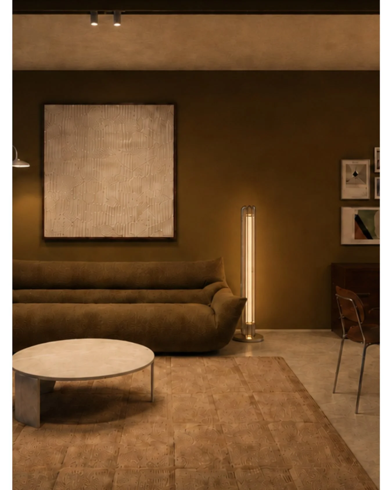 The lighting scheme was designed to give the room a completely different character at night.

With the existing concrete soffit, we had to work carefully with the electrical points already available. A new painted timber &lsquo;spine&rsquo; was intro