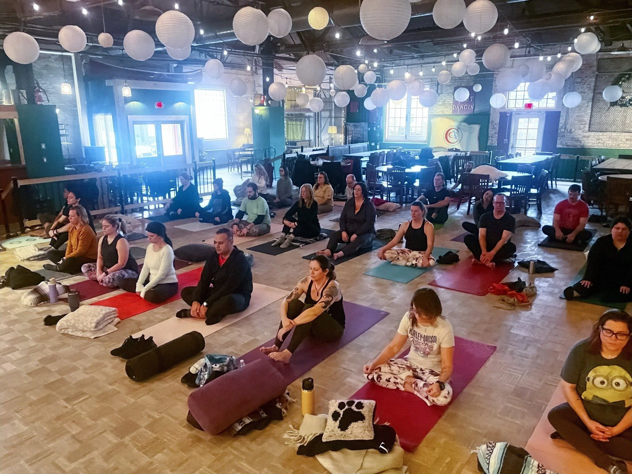 Tapped In Yoga in the beer garden at Forest City Brewery 