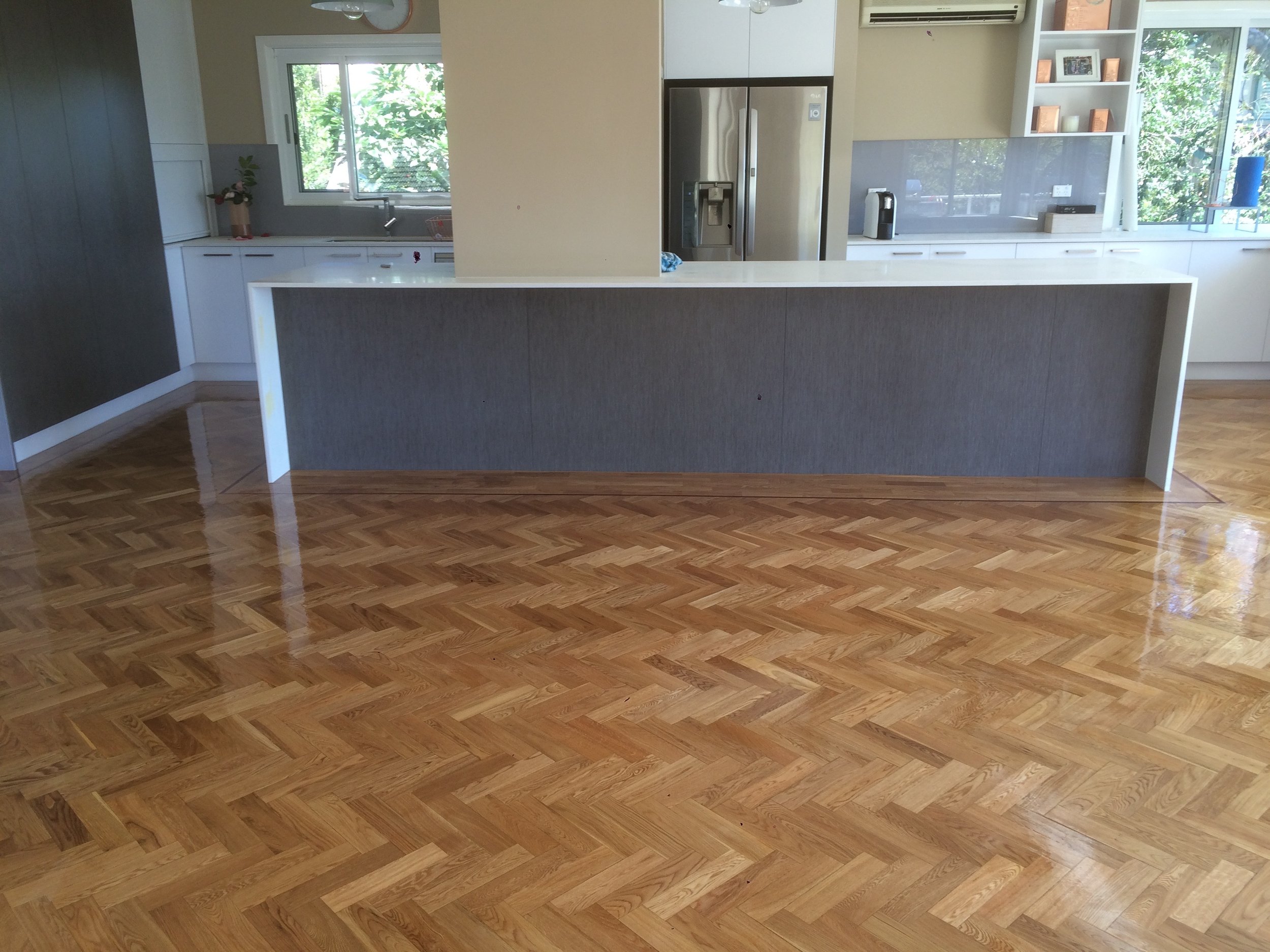  White Oak parquet laid in a single herringbone pattern 