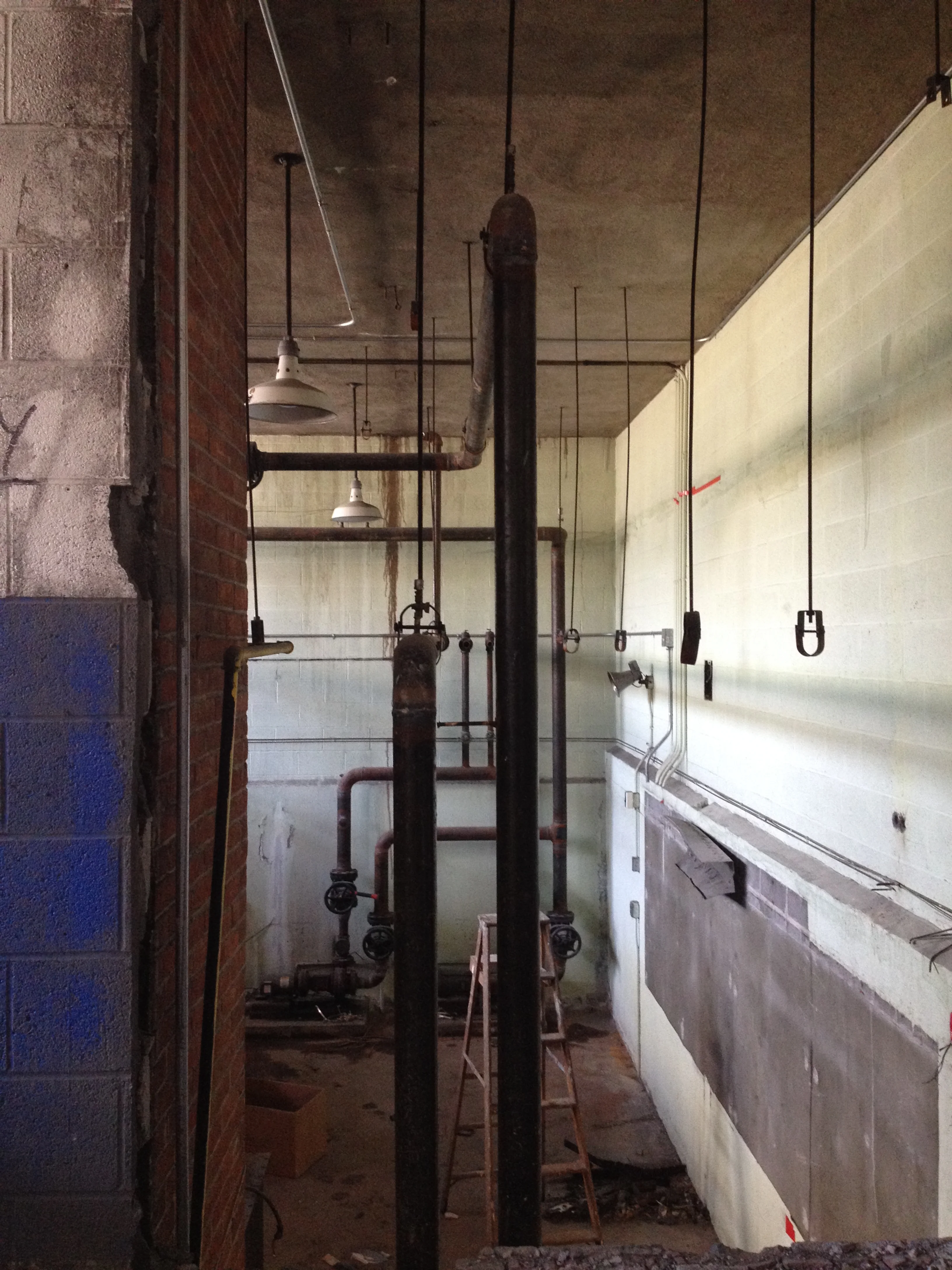 Continued demolition in the "Boiler Room", which will be a unique double-height apartment unit.