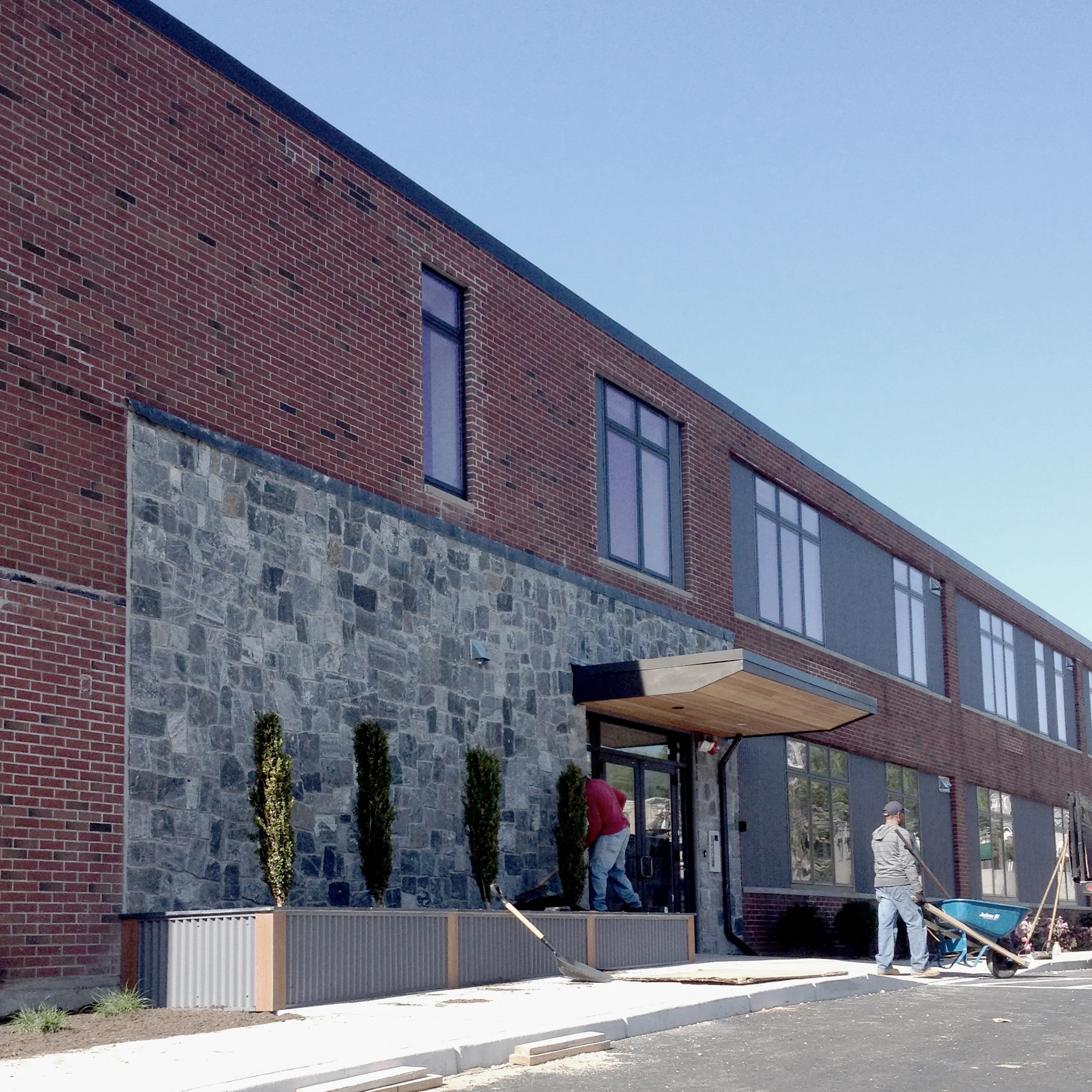 New landscaping at the front entrance.