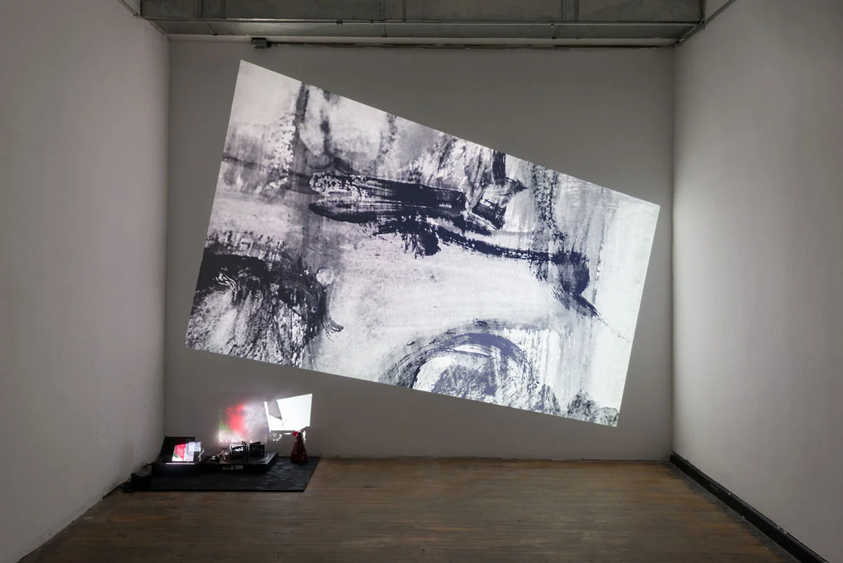 Cassie Riger, Night of the Hunter, installation art, handmade slide, record player