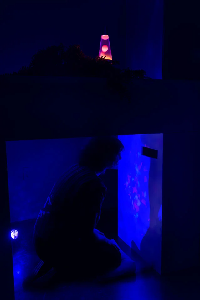 Kinetoscope Parlor Set: Interior Design (2018) (Detail view); Video sculpture (single channel video with found footage, wood, paint, mirror, artificial plants, lava lamp, fire-and-ice lamp); 48”x 60”x 24”, 4 minute 45 second video