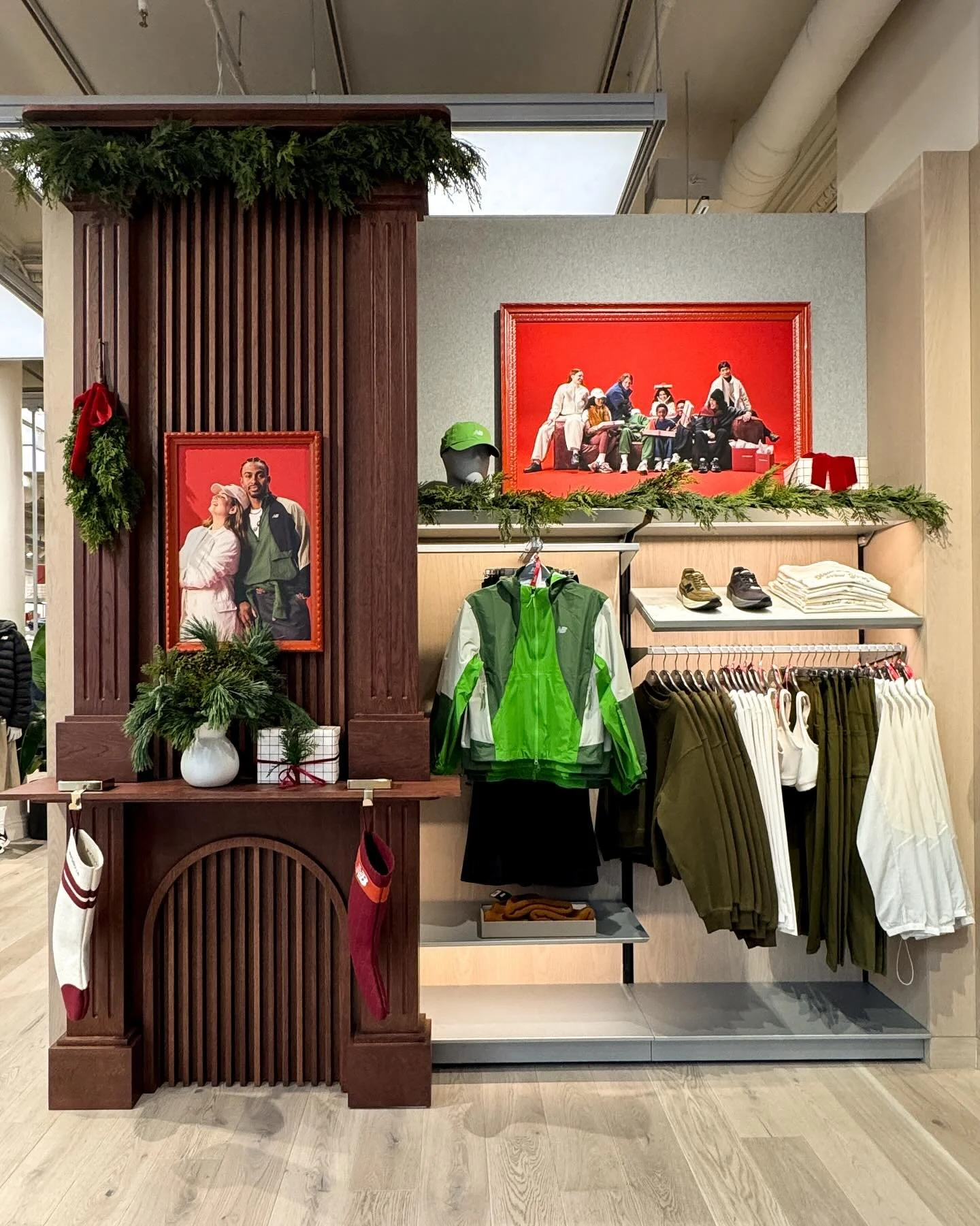 Happy Holidays from Sets &amp; Effects✨featuring our cozy New Balance SoHo holiday build🎅🏼🎄We made a decorative fireplace and branded panel in rift-sawn white oak and finished with a rich mahogany stain&mdash;plus window vinyls and festive garland