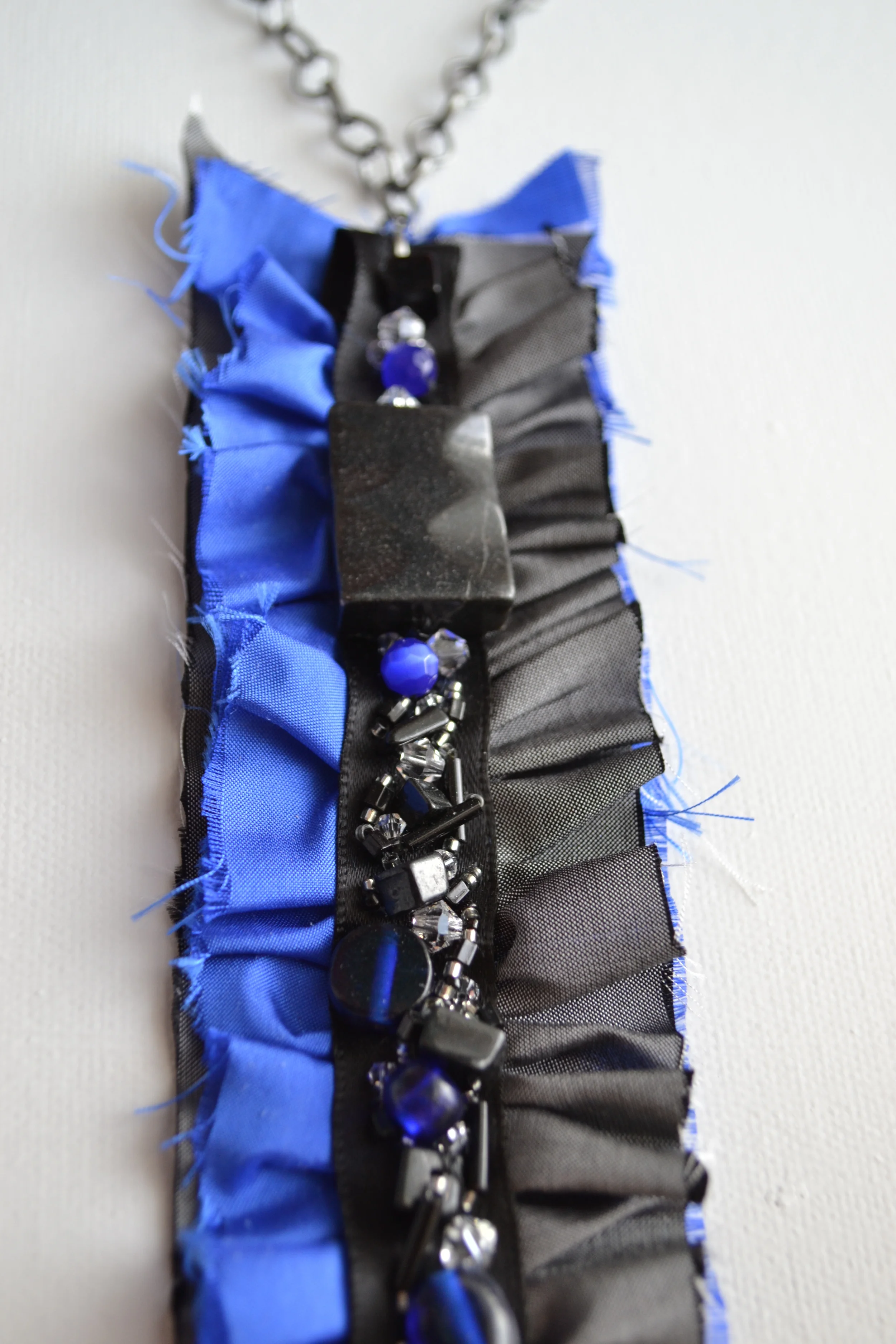 Arrow Style necklace from L.E.W. designs.Bright blue and grey silk. Click through for more information. (2).JPG