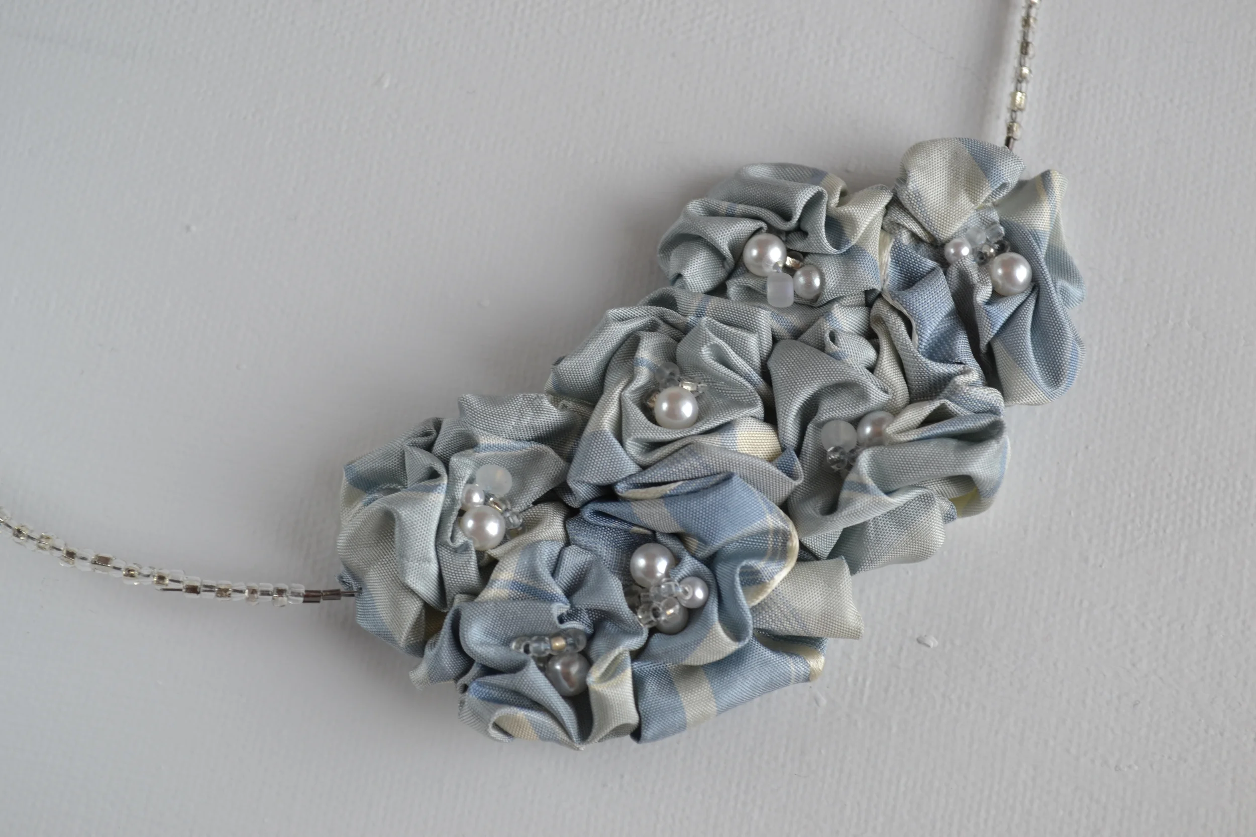 Bouquet style necklace from L.E.W. designs. Blue gingham silk and glass pearls. Hand sewn. Click through for more information. (5).JPG