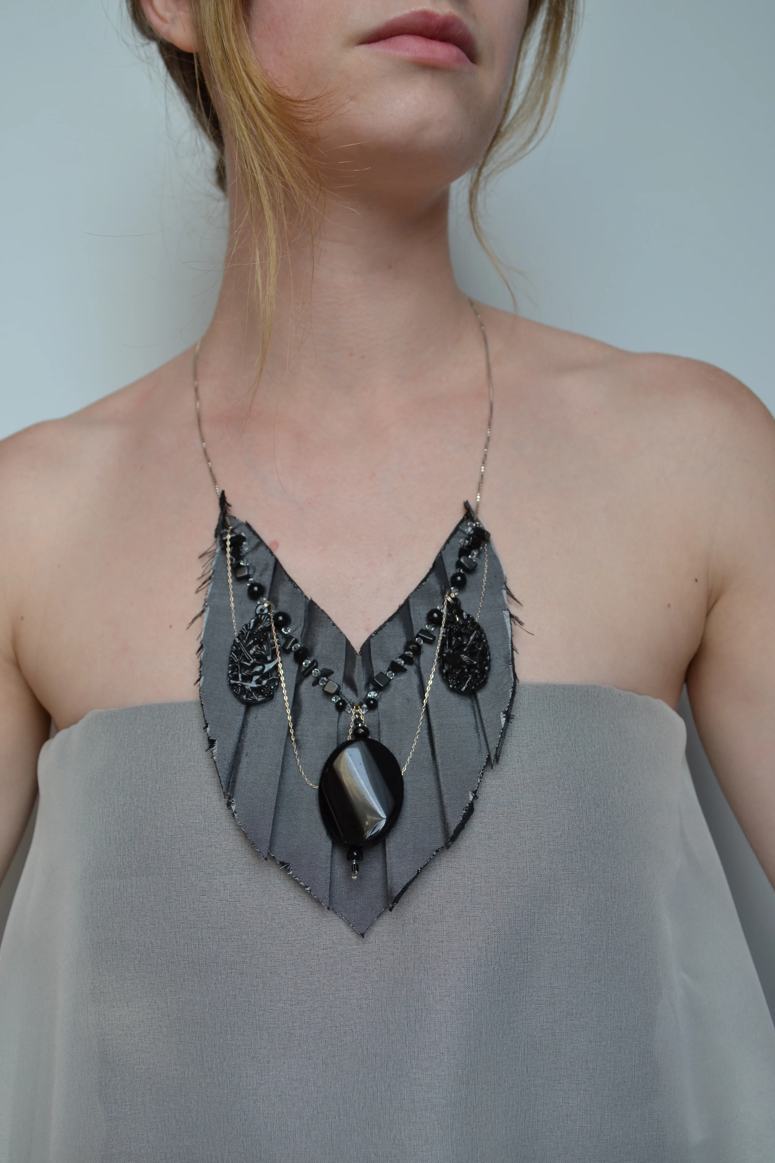 Damsel style necklace from L.E.W. designs. Grey silk and sterling chain. Click through for more information..JPG