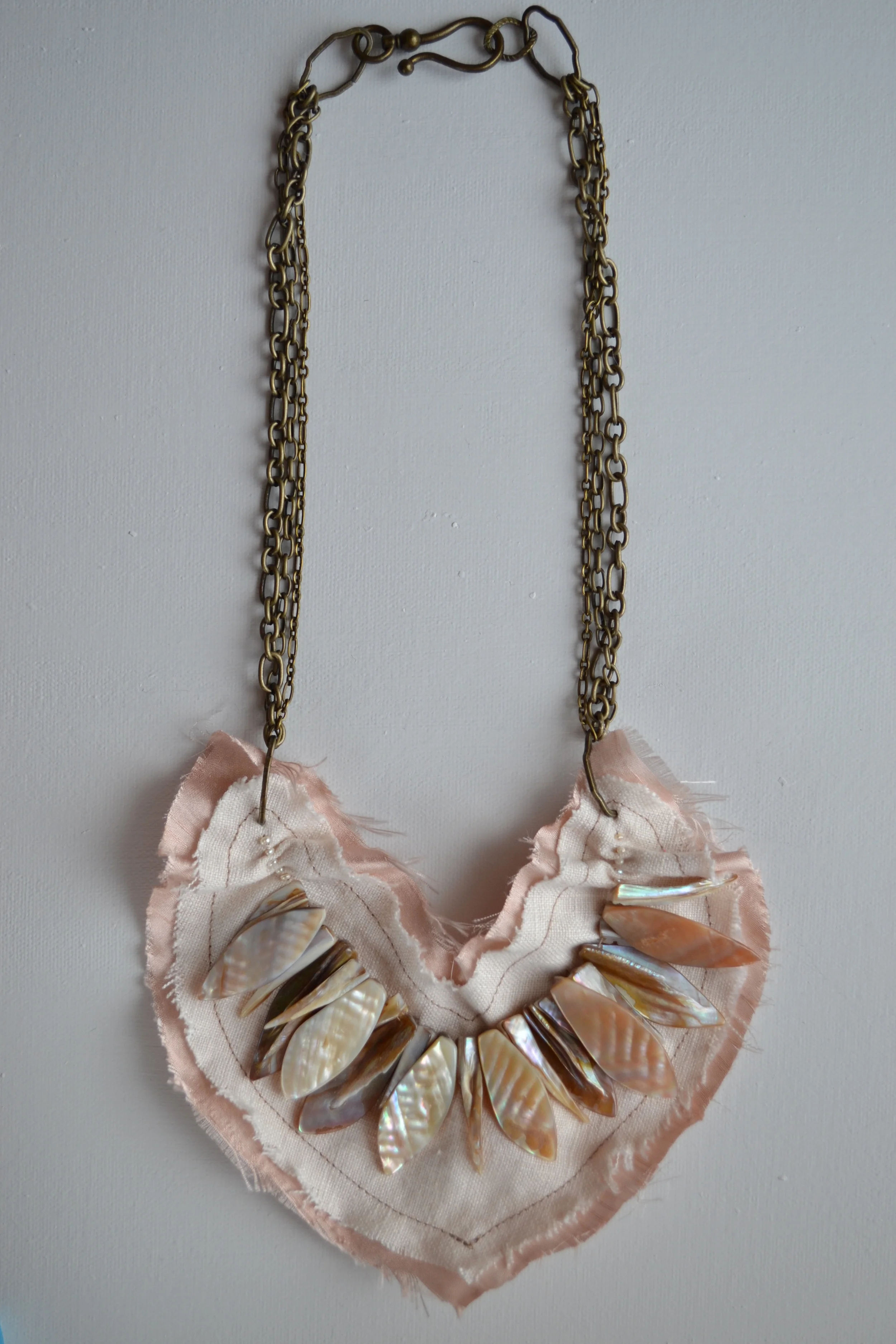 Bib Style necklace from L.E.W. designs. Pink silk, natural linen and shells. Click through for more information..JPG