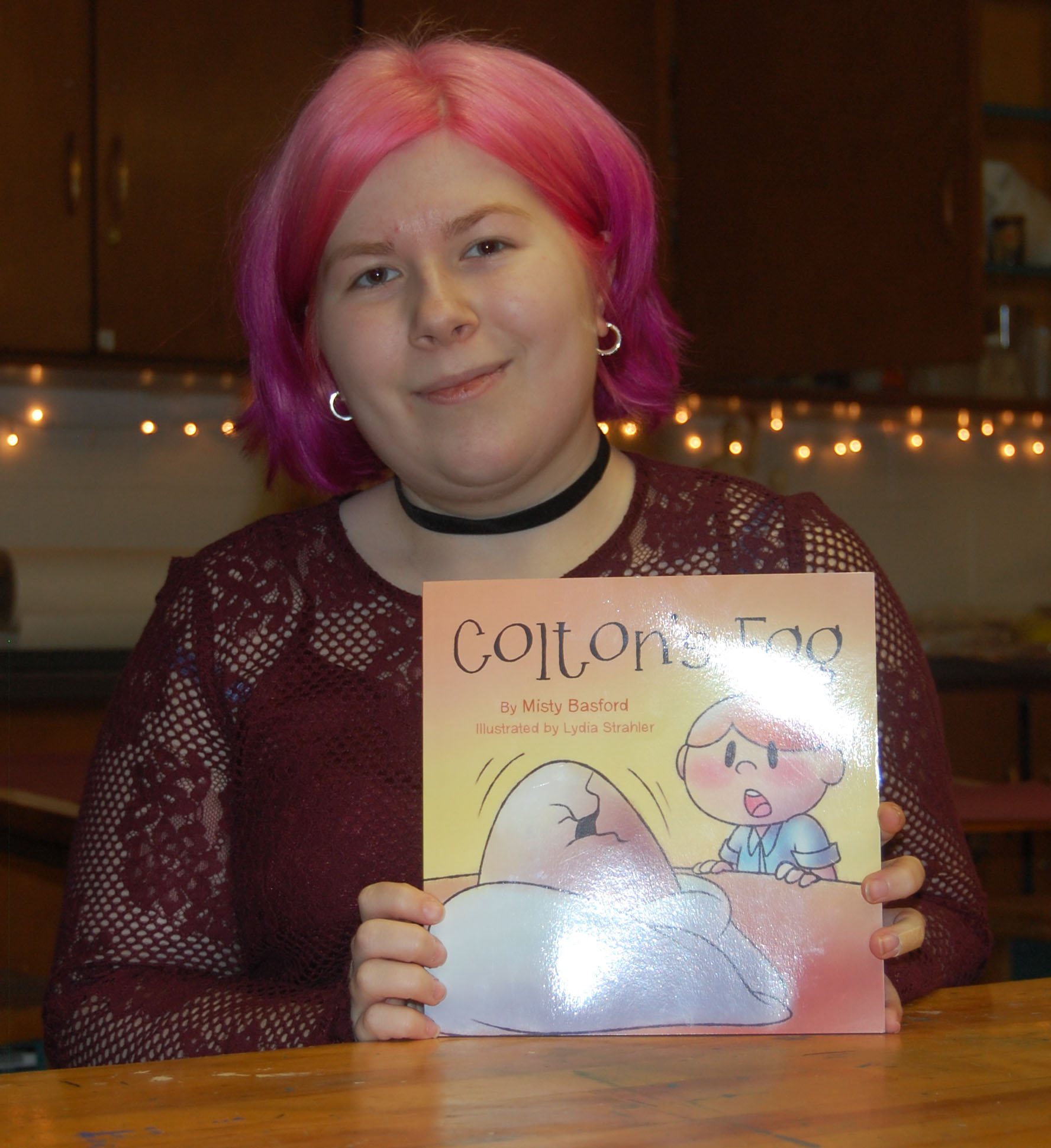 Lydia Strahler recently visited the Elms and brought along a copy of the children's book she recently illustrated.
