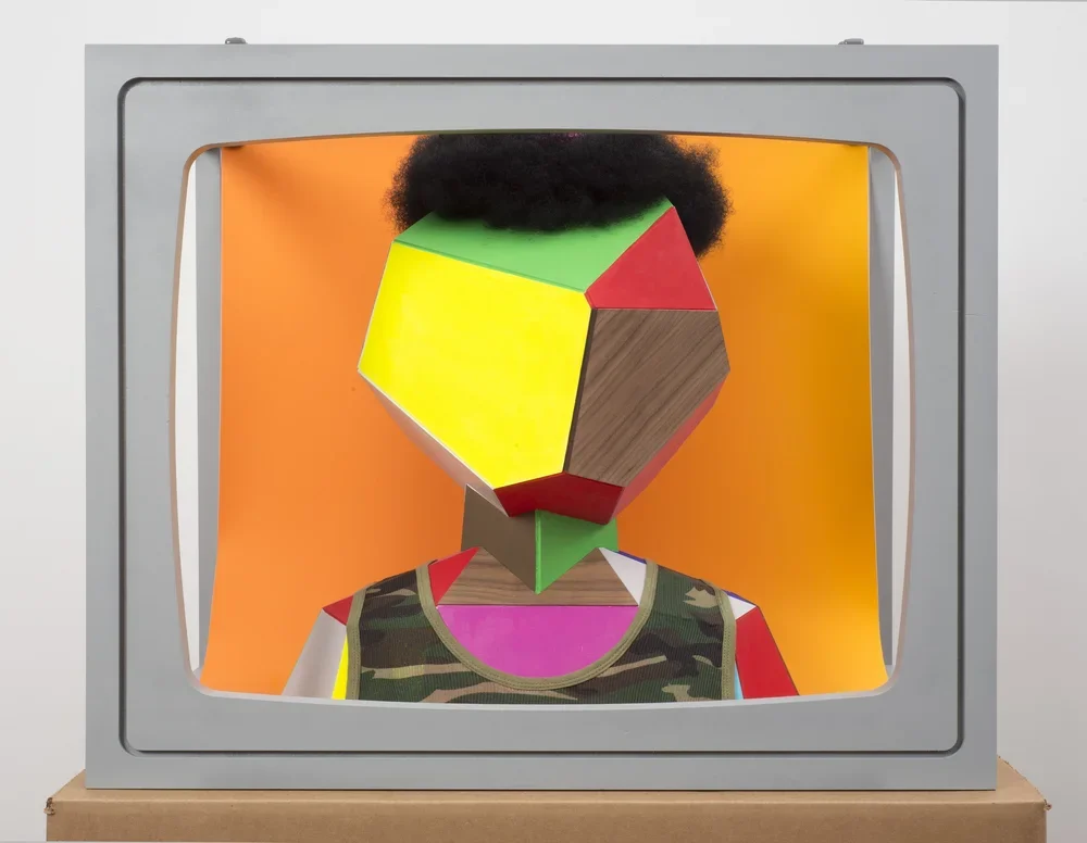  Boxhead 4. 2014.  
 
Mixed media sculpture. 23 in. x 28 in. x 19 in. From the “LIVE and IN COLOR” series. 