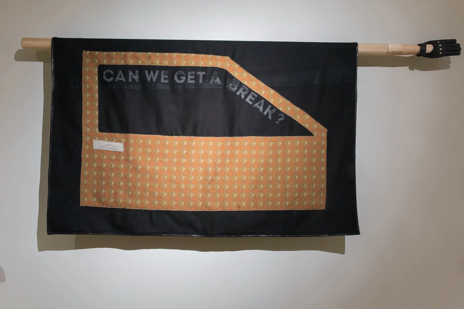  En Route 3: We've Come A Looong Way. 2018.  
 
Fabric, thread, leather, wood, and metal hardware. 40 in. x 85 in. From the “Sanctuary” series. 