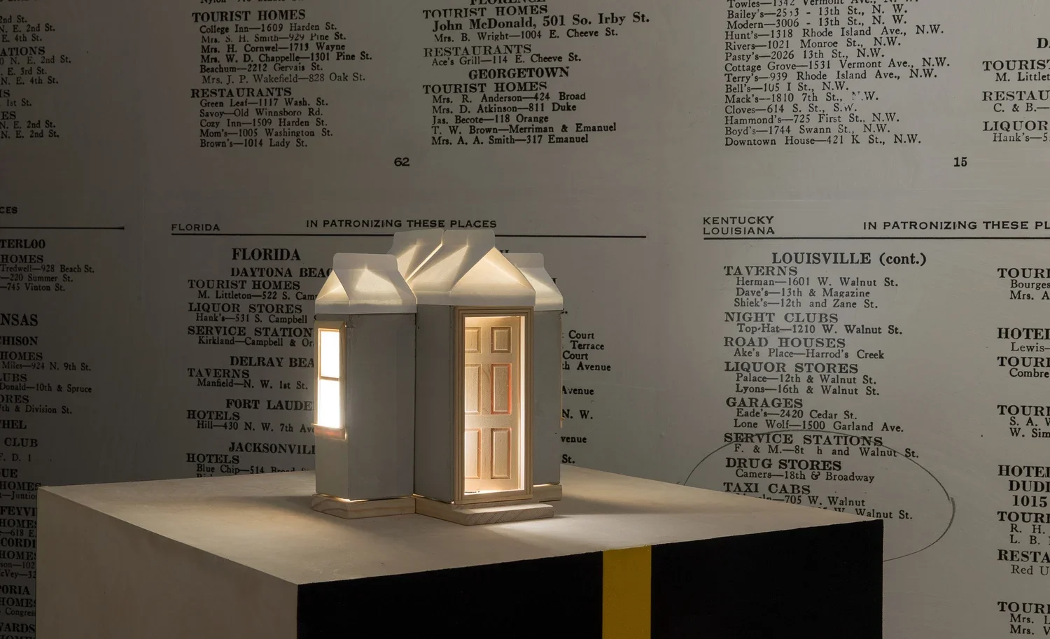  Beacon 2. 2018.  
 
Concrete, wood, paper, light fixture, bulb. 10.875 in. x 11.625 in. x 8.75 in. From the “Sanctuary” series. 