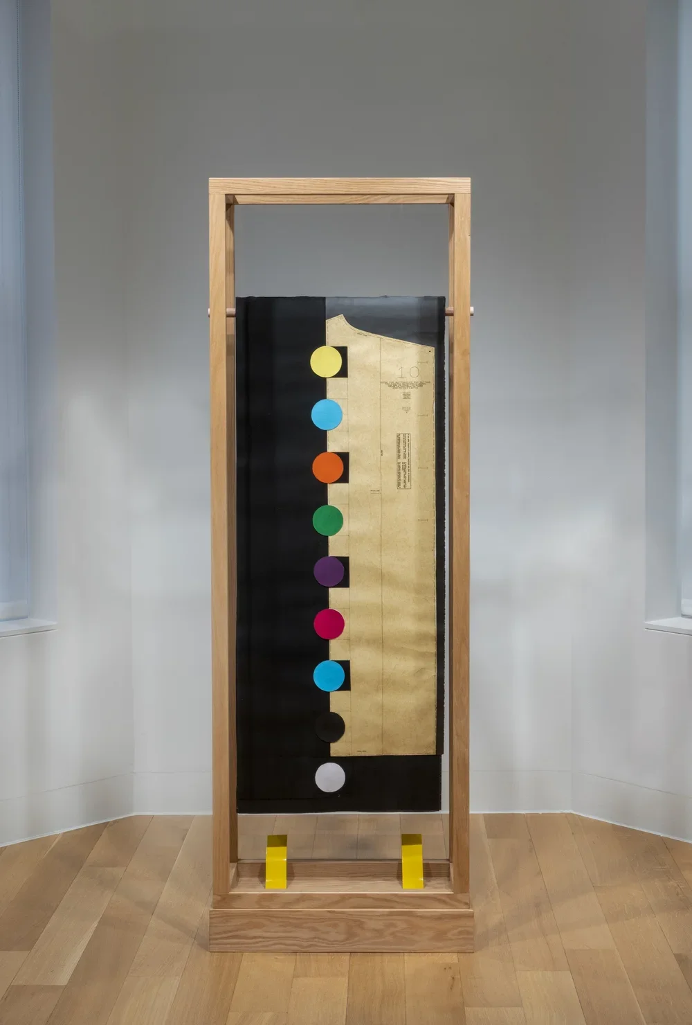  Pose 1. 2017.  
 
Acrylic paint, clothing patterns, fabric, paper, painted aluminum, oak, plexiglass. 72 in. x 24 in. x 12 in. From the “Moodboard” series. 