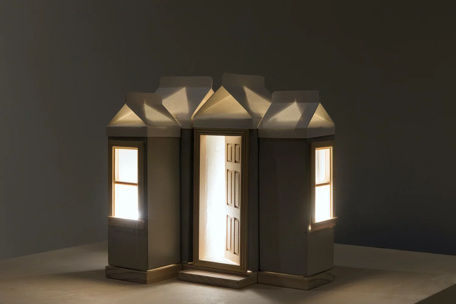  Beacon 5. 2018.  
 
Concrete, wood, paper, light fixture, bulb. 10.875 in. x 11.625 in. x 8.75 in. From the “Sanctuary” series. 