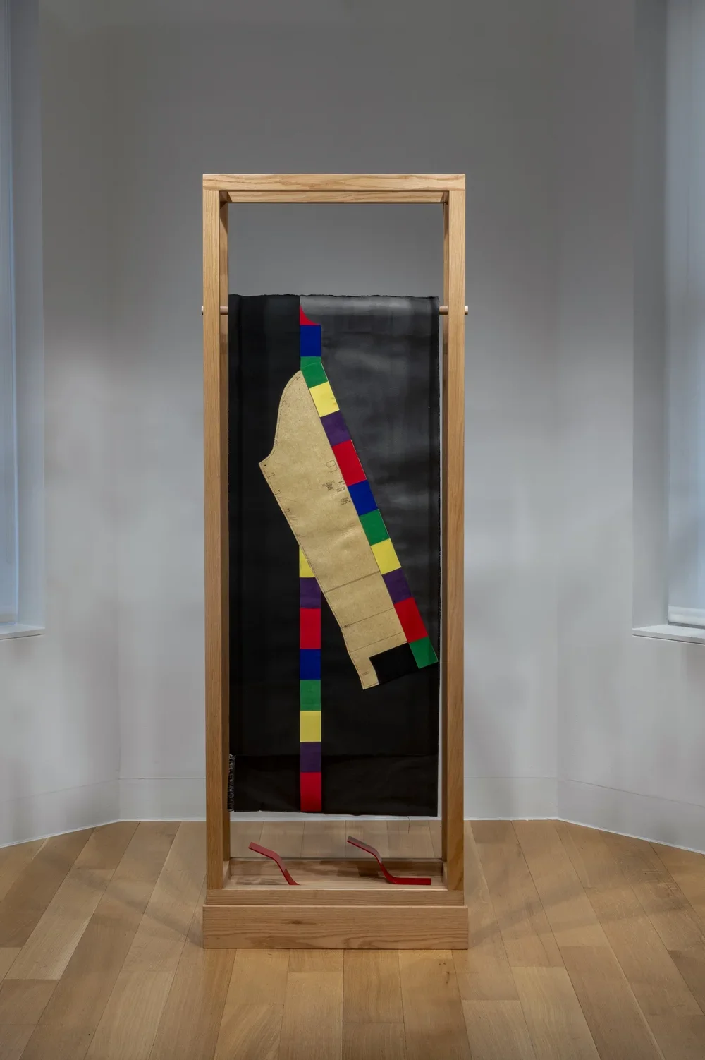  Pose 3. 2017.  
 
Acrylic paint, clothing patterns, fabric, paper, painted aluminum, oak, plexiglass. 72 in. x 24 in. x 12 in. From the “Moodboard” series. 