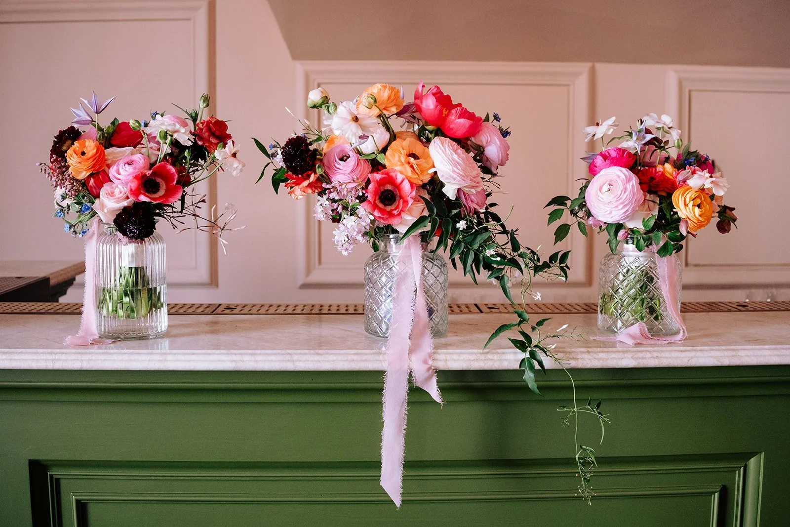 spring bridal bouquets lined up on the bar waiting collection,
