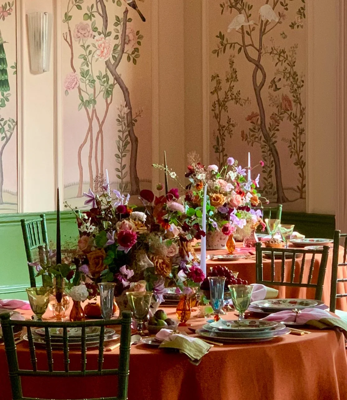 a luxurious tablescape of stunning seasonal flowers in the elegant Ballroom at the George Hotel in Rye, featuring seasonal flowers in rich burgundy's, lilac, peach and caramel tones.
