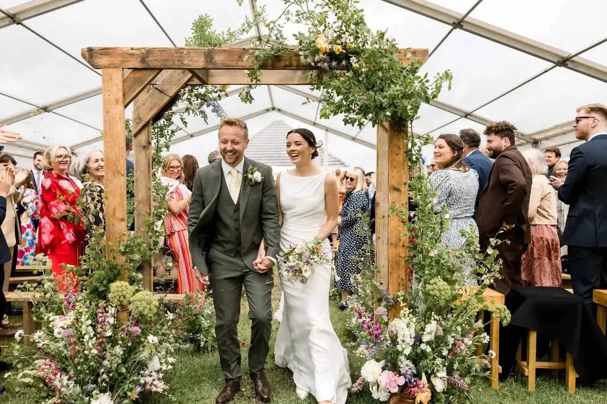 Wedding Rustic floral arch at The Cherry Barn