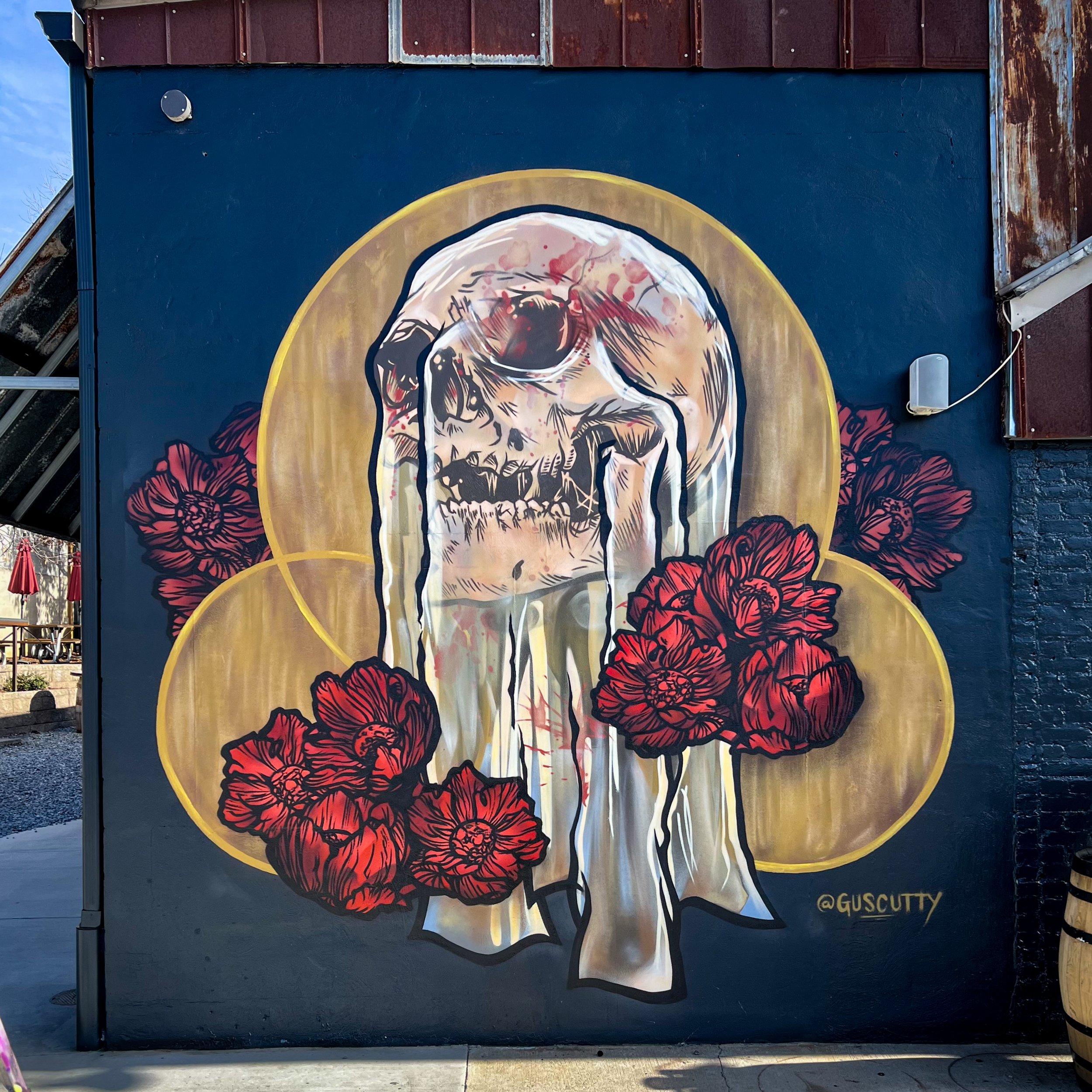 gus-cutty-burial-brewing-skull-flowers-asheville-nc-mural-aerosol-2022.jpg