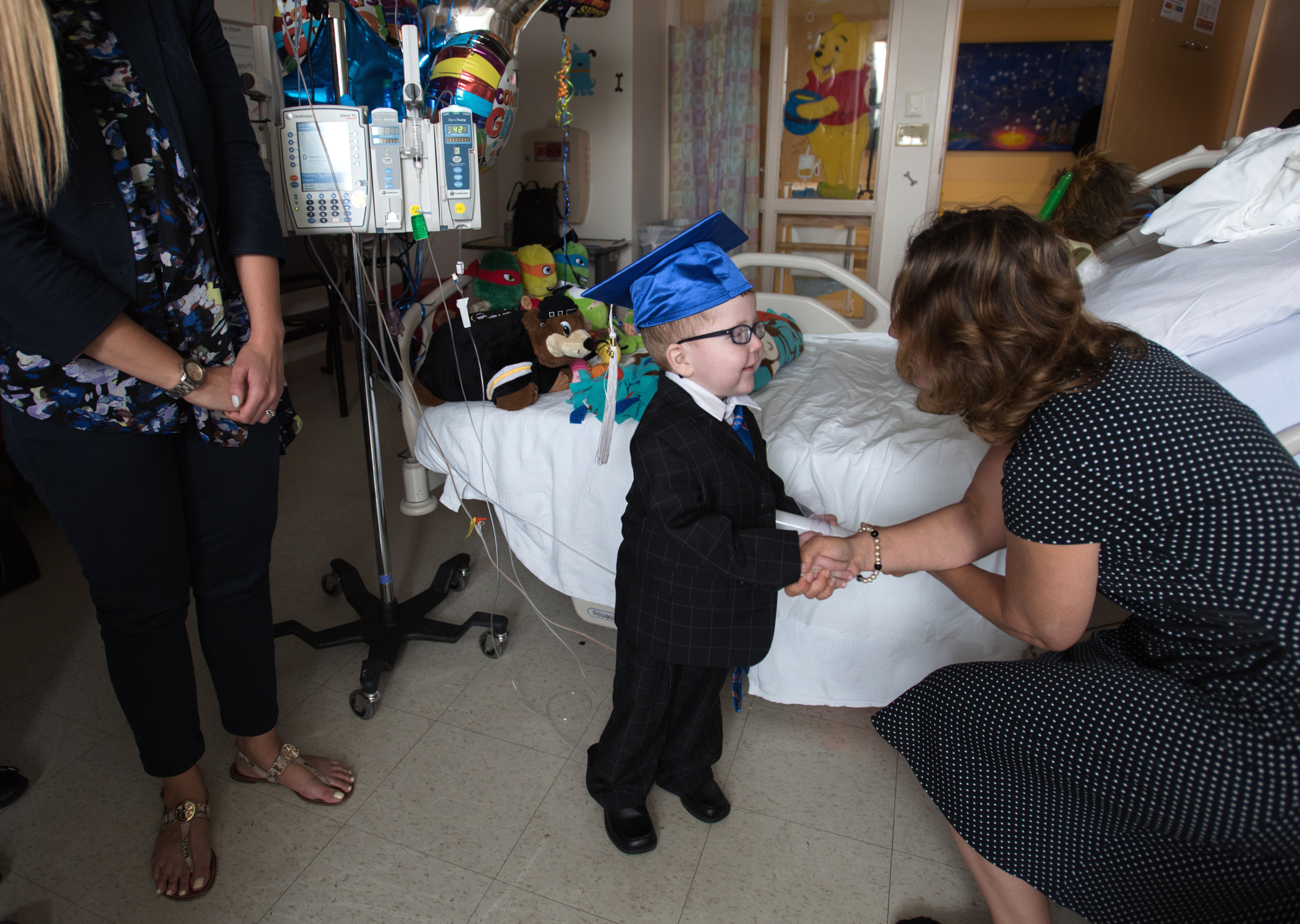 Lucas, a multi-organ transplant recipient who missed his pre-school graduation ceremony due to his hospital stay, matriculates bedside when his teachers make a special visit from Lowell, Mass.