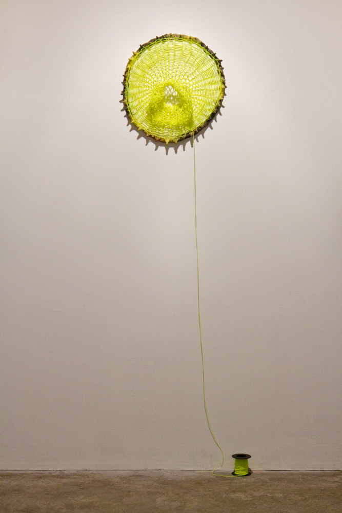   Loom Clock II , 2012, Clay and plastic, 2 x 18 x 18 in. 