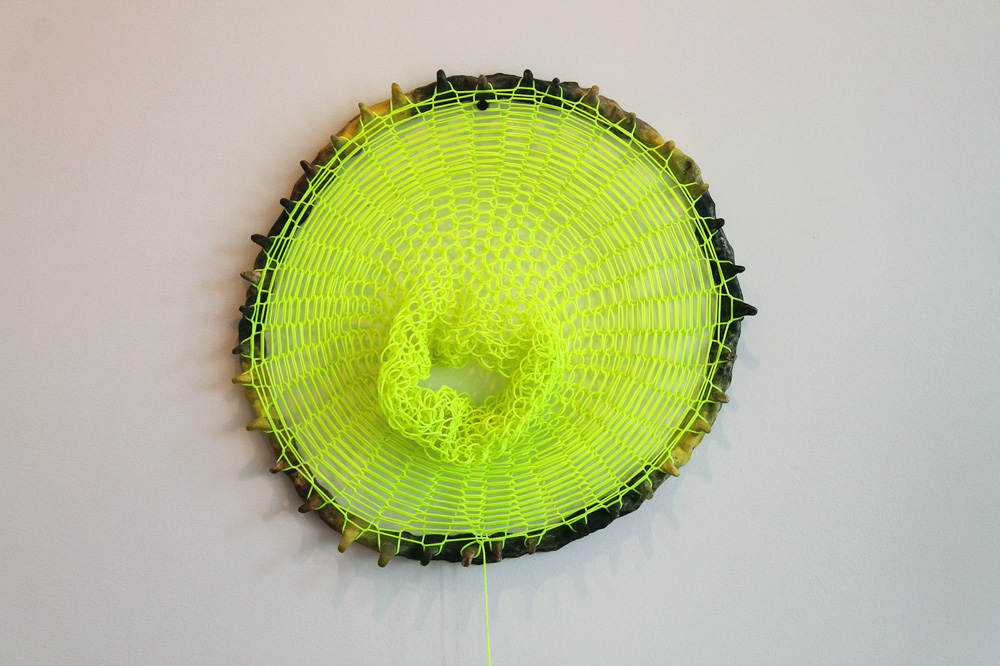   Loom Clock II , 2012, Clay and plastic, 2 x 18 x 18 in. 