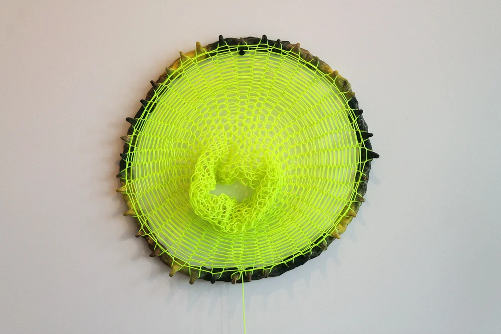 Loom Clock II , 2012, Clay and plastic, 2 x 18 x 18 in.