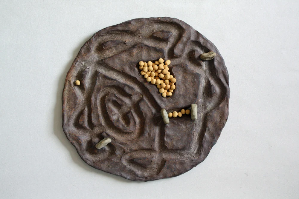 Flat Abacus , 2012, Clay, pigment and camping rope, 3 x 14 x 13 in.