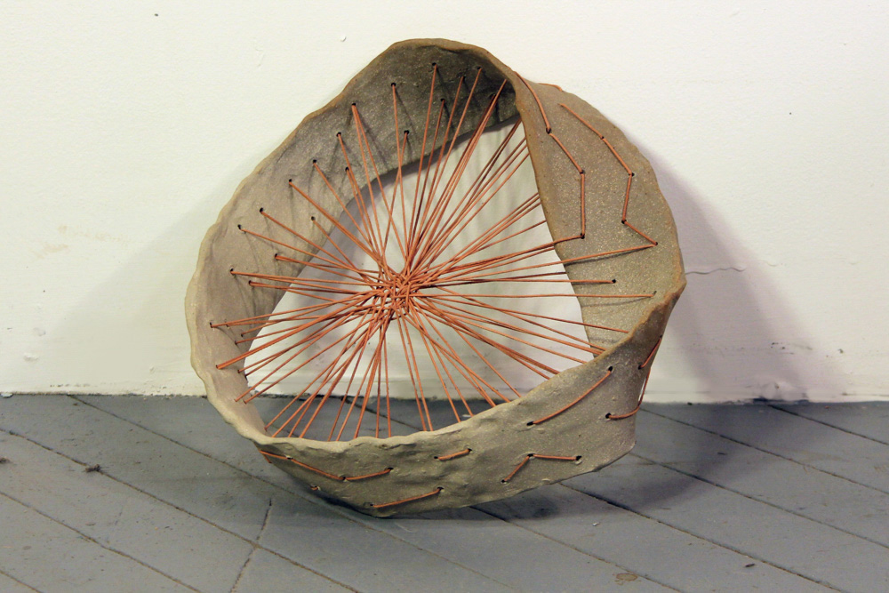   Mobius Strip Abacus #1 , 2011, Clay and leather, 14 x 11 x 6 in. 