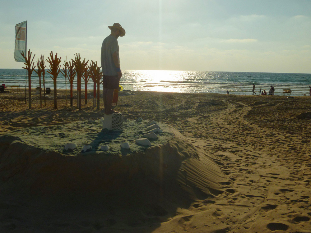  Guy Ben-Ari and Leah Wolff,  Time Loops - Human Sundial , 2011, Sand, plaster and acrylic paint, 5 x 14 x 14 ft 