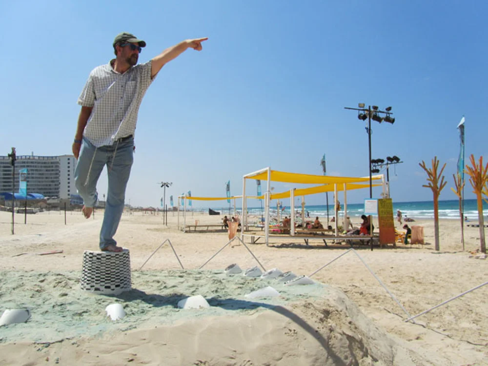 Guy Ben-Ari and Leah Wolff, Time Loops - Human Sundial , 2011, Sand, plaster and acrylic paint, 5 x 14 x 14 ft