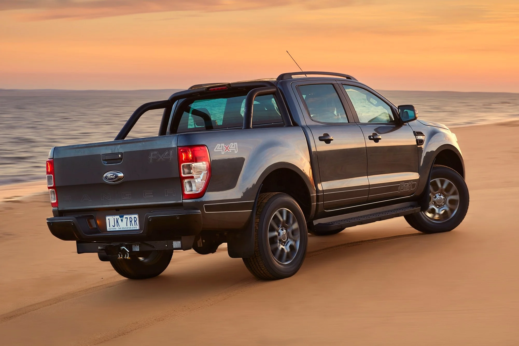 A picture of a Ford Ranger FX4 on a beach.   Photographed by a melbourne car photographer.