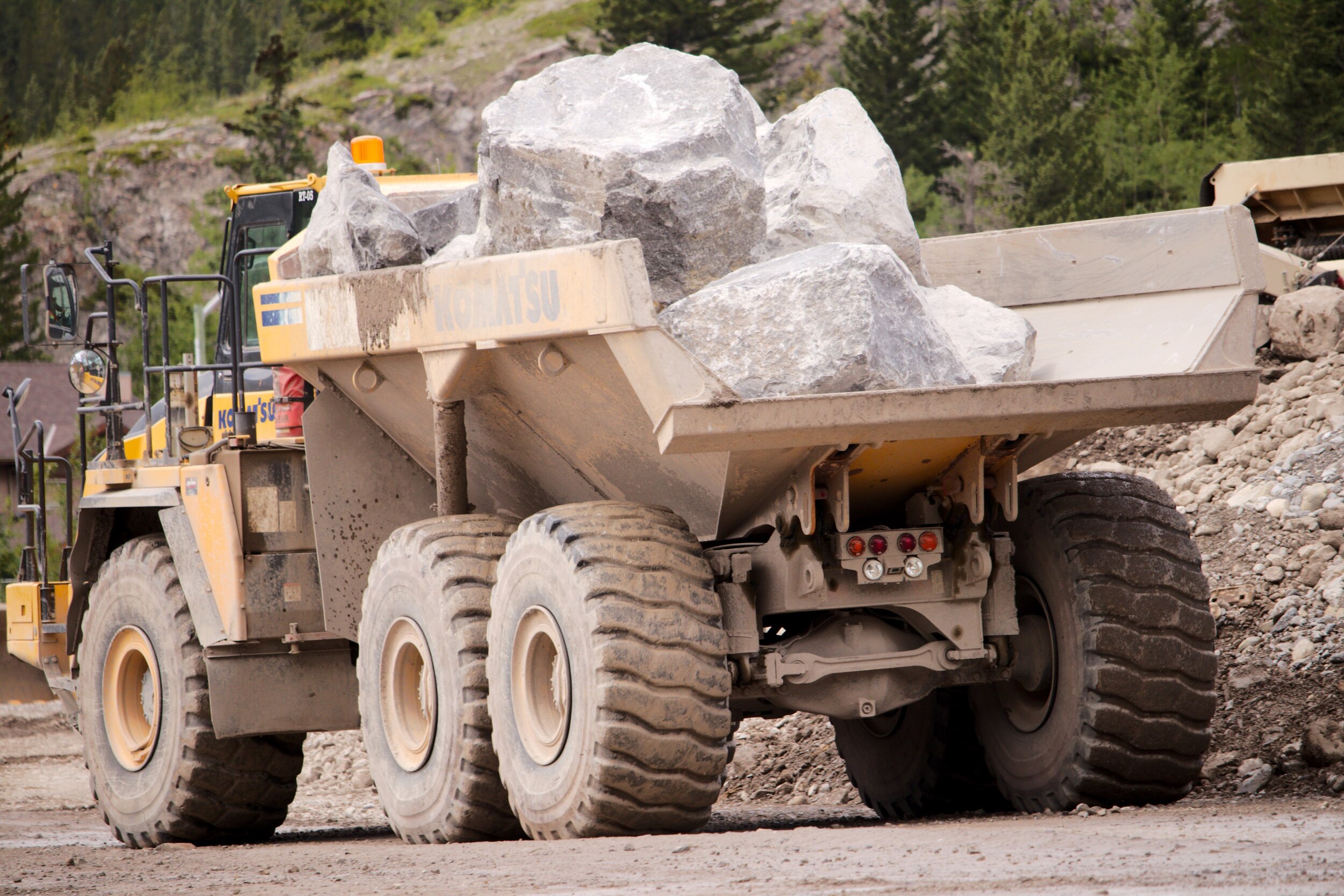 service truck hauling rocks
