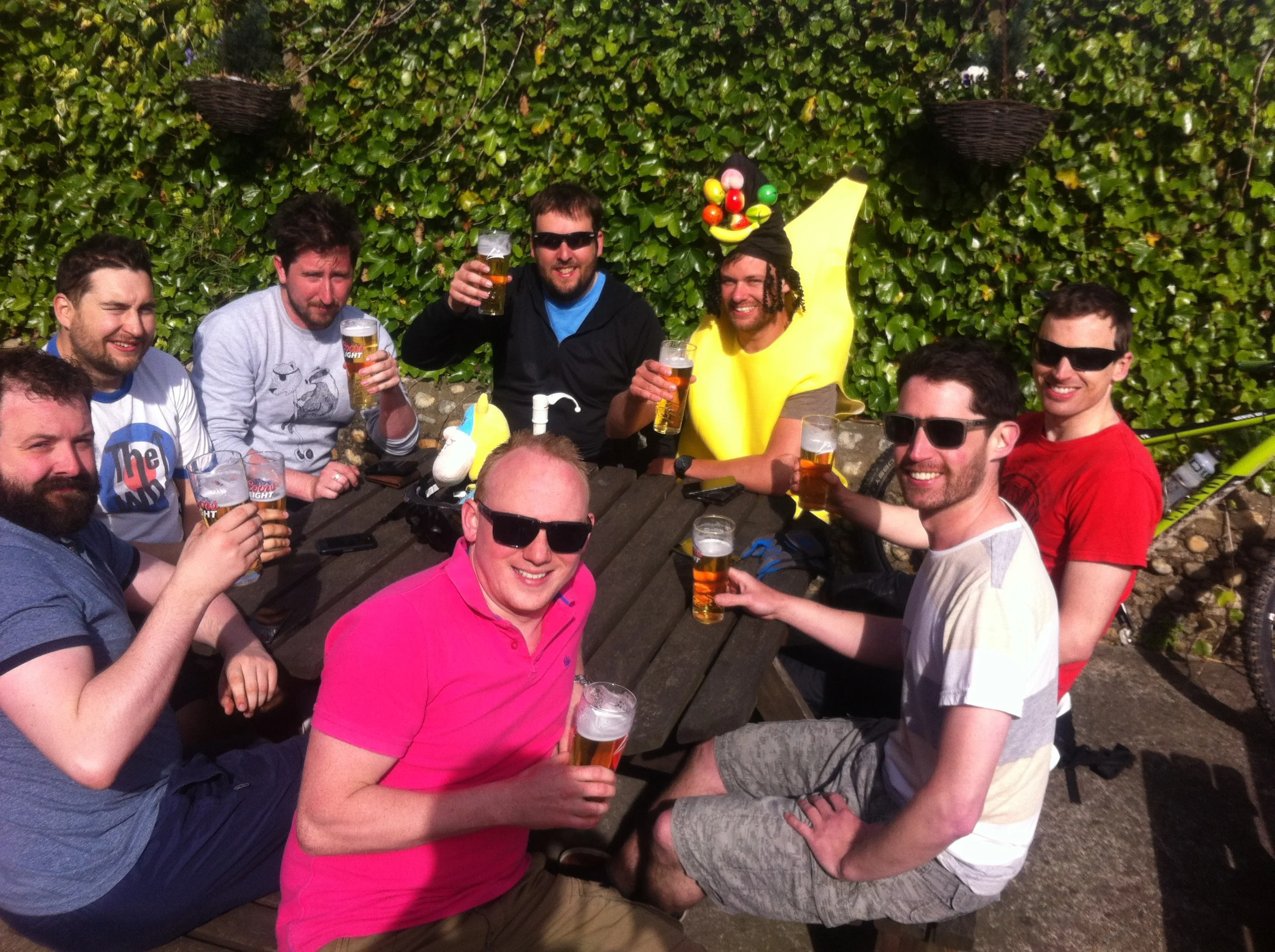 Clockwise from far left: Shane, Seth, Steve, Tim, Carmen Miranda, Martyn, Nadav and Jack with the first of their beers. 