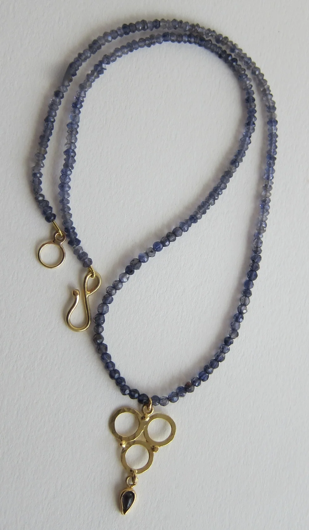 Iolite neckpiece with 18kt gold circles and Iolite drop