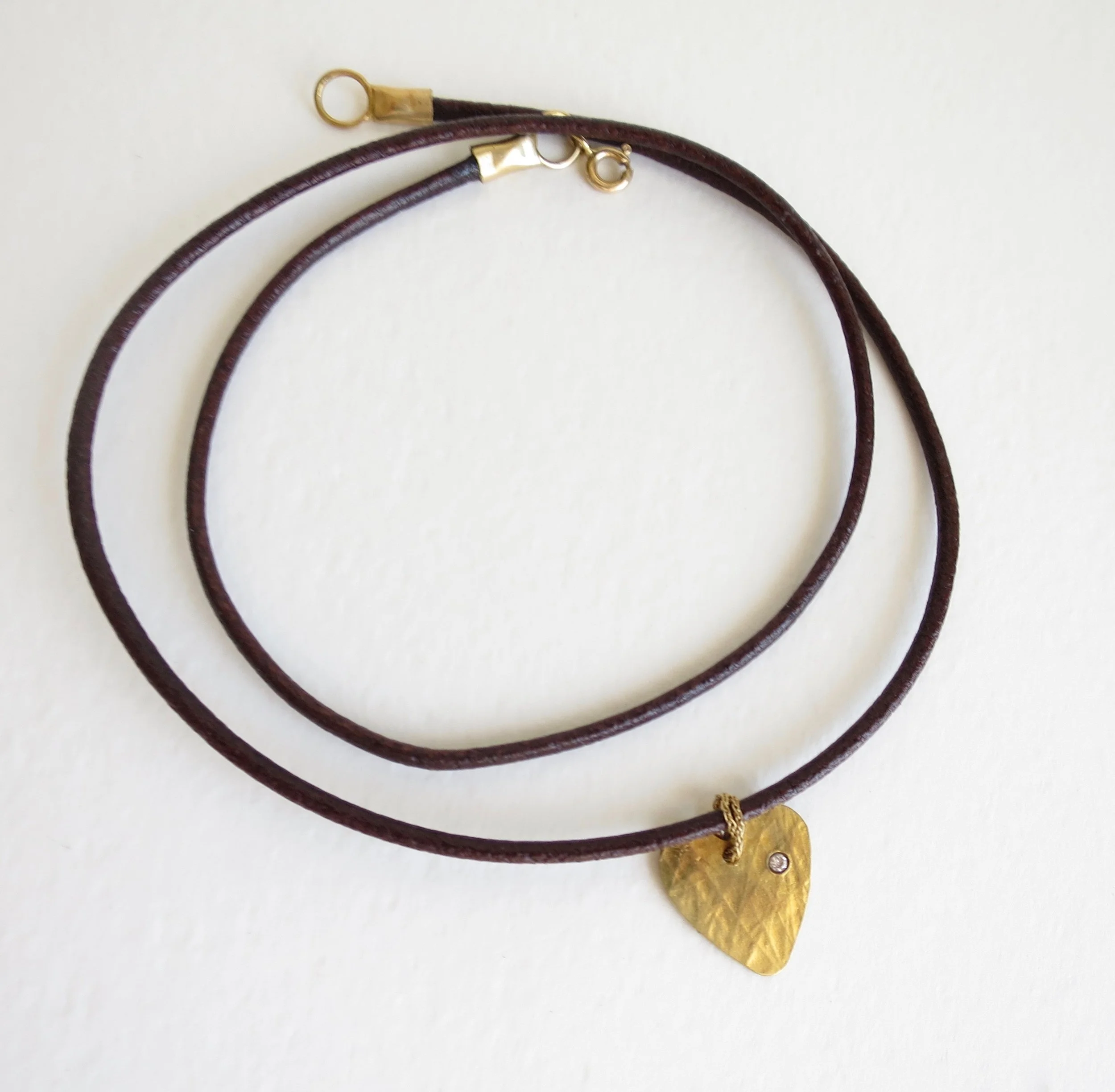 Gold heart with diamond 