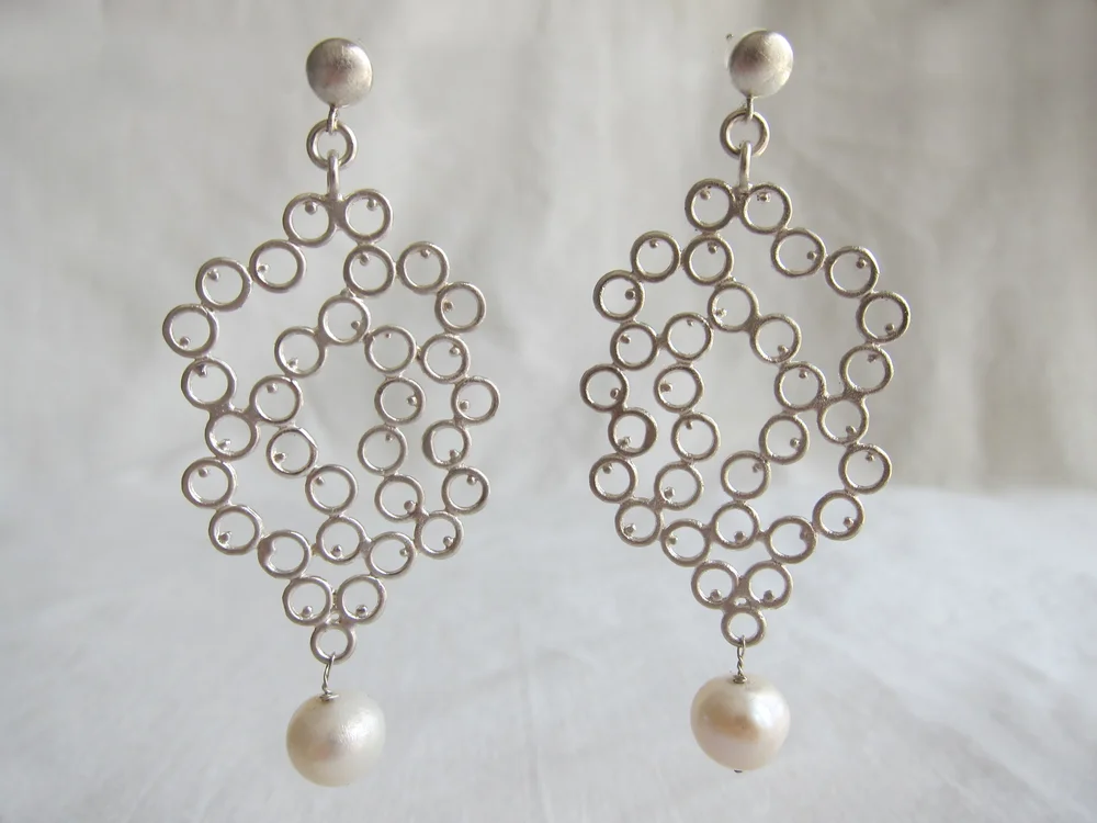 Silver ornament earrings with pearl drop