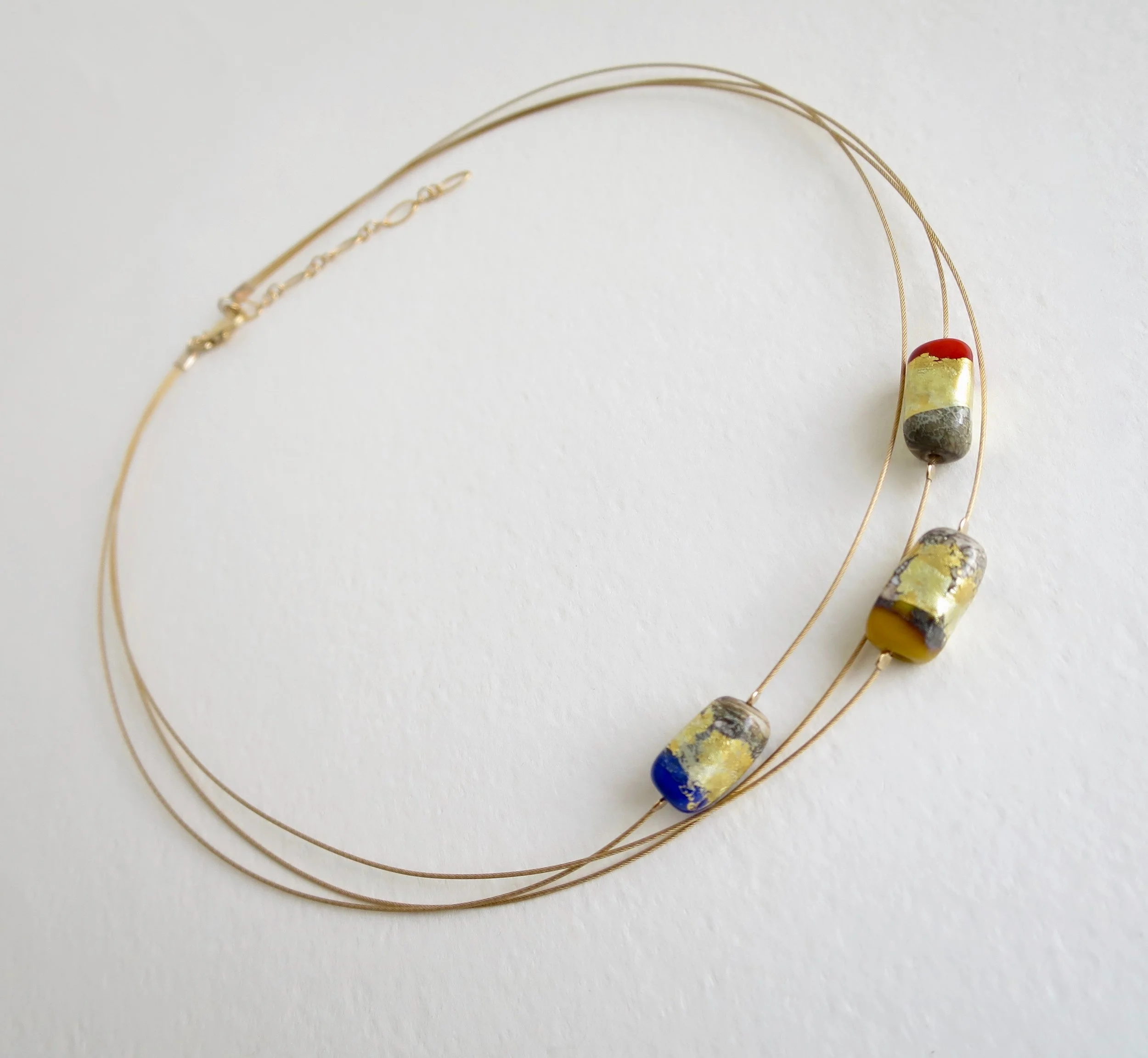 Blown glass in blue, red and orange tones