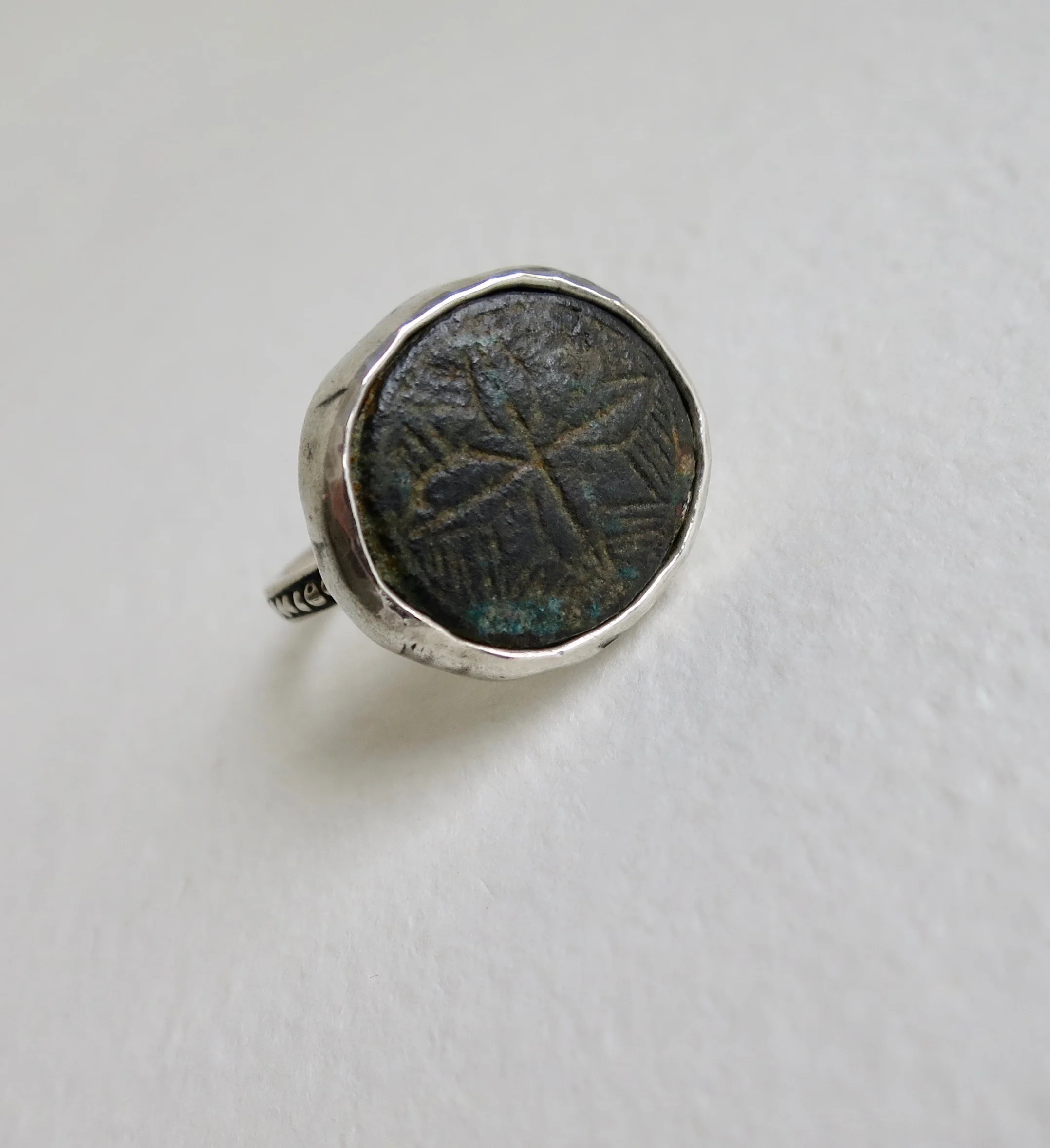 Bronze bezel set in silver ring