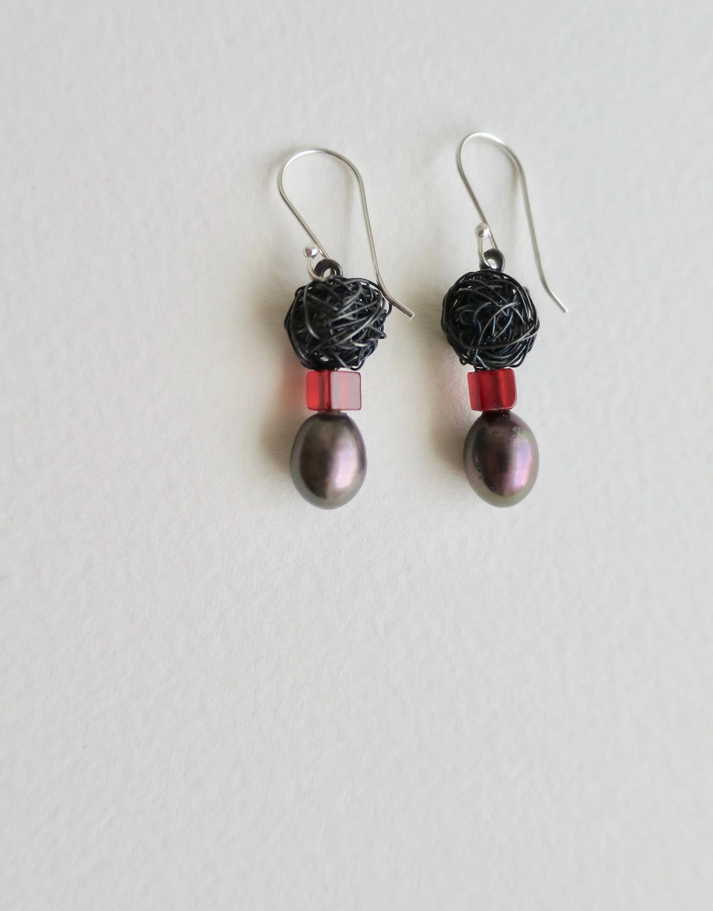 Brown pearl and black plonter earrings with Carnelian