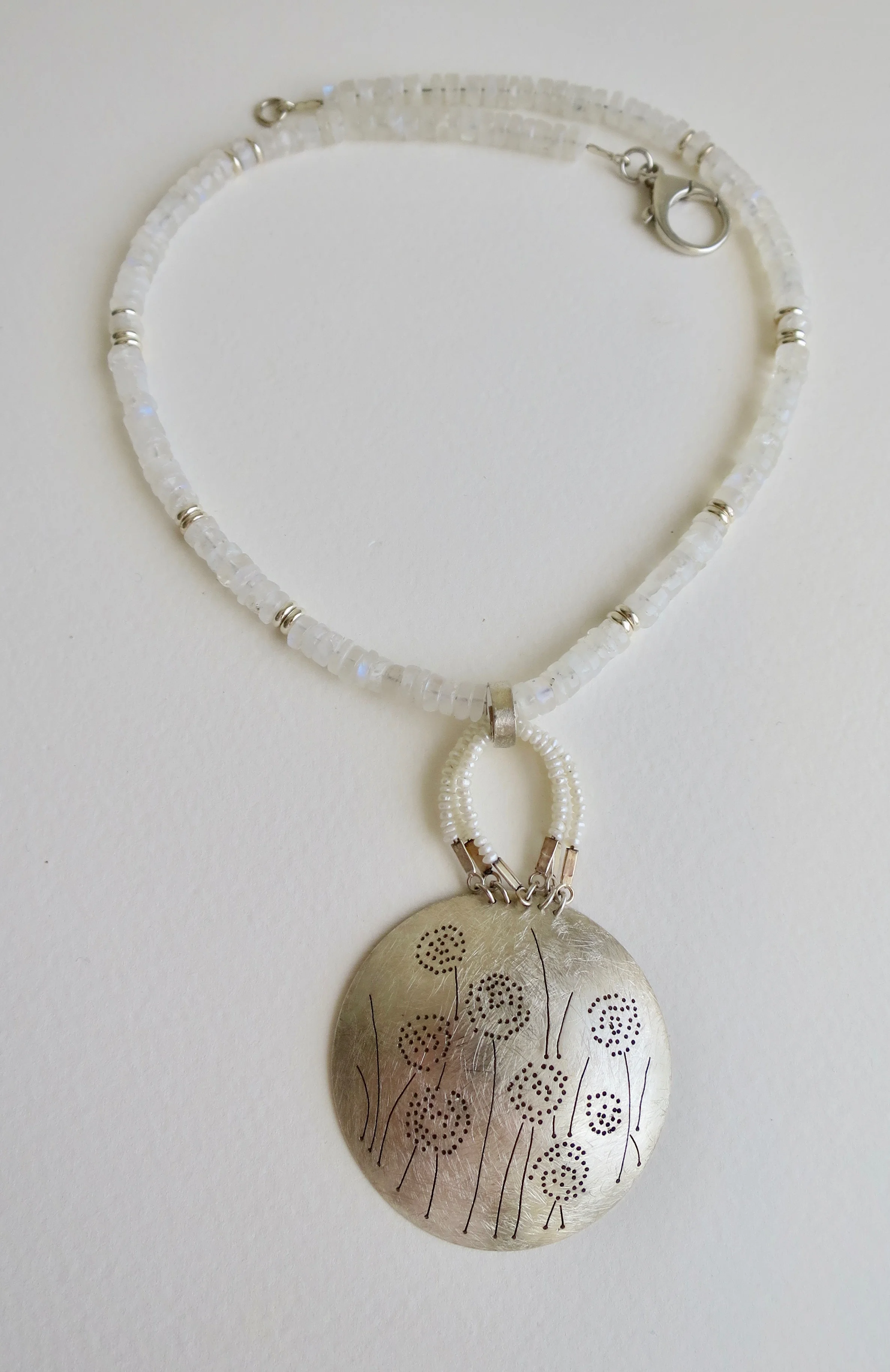 Moonstone necklace with handmade silver and pearl centrepiece 