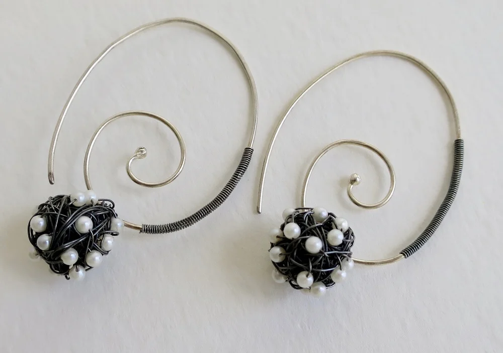 Profile earrings, sterling silver with Plonter