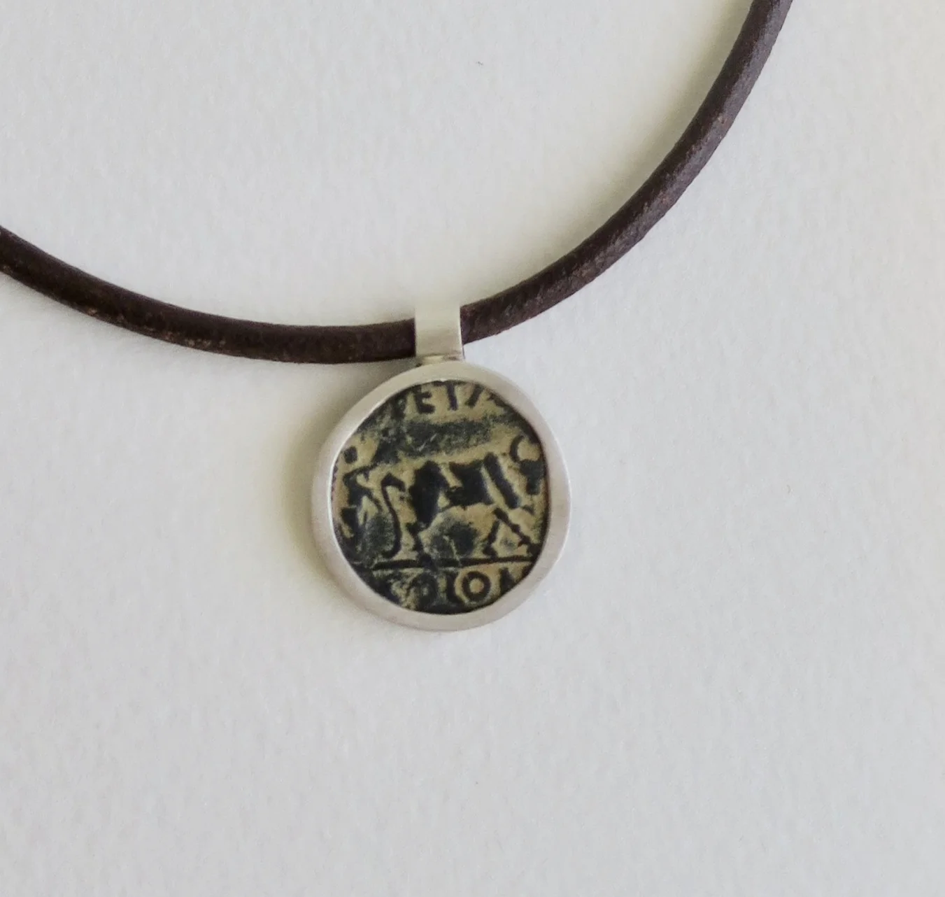 Jewellery Jewelry Bronze Petra coin set in silver pendant