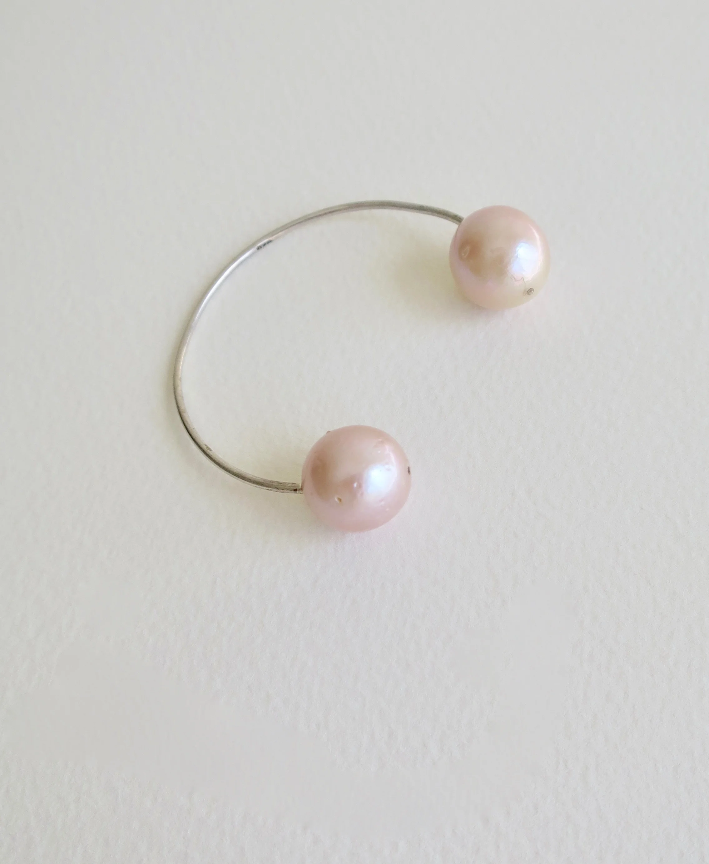 Silver bangle with pink Pearls