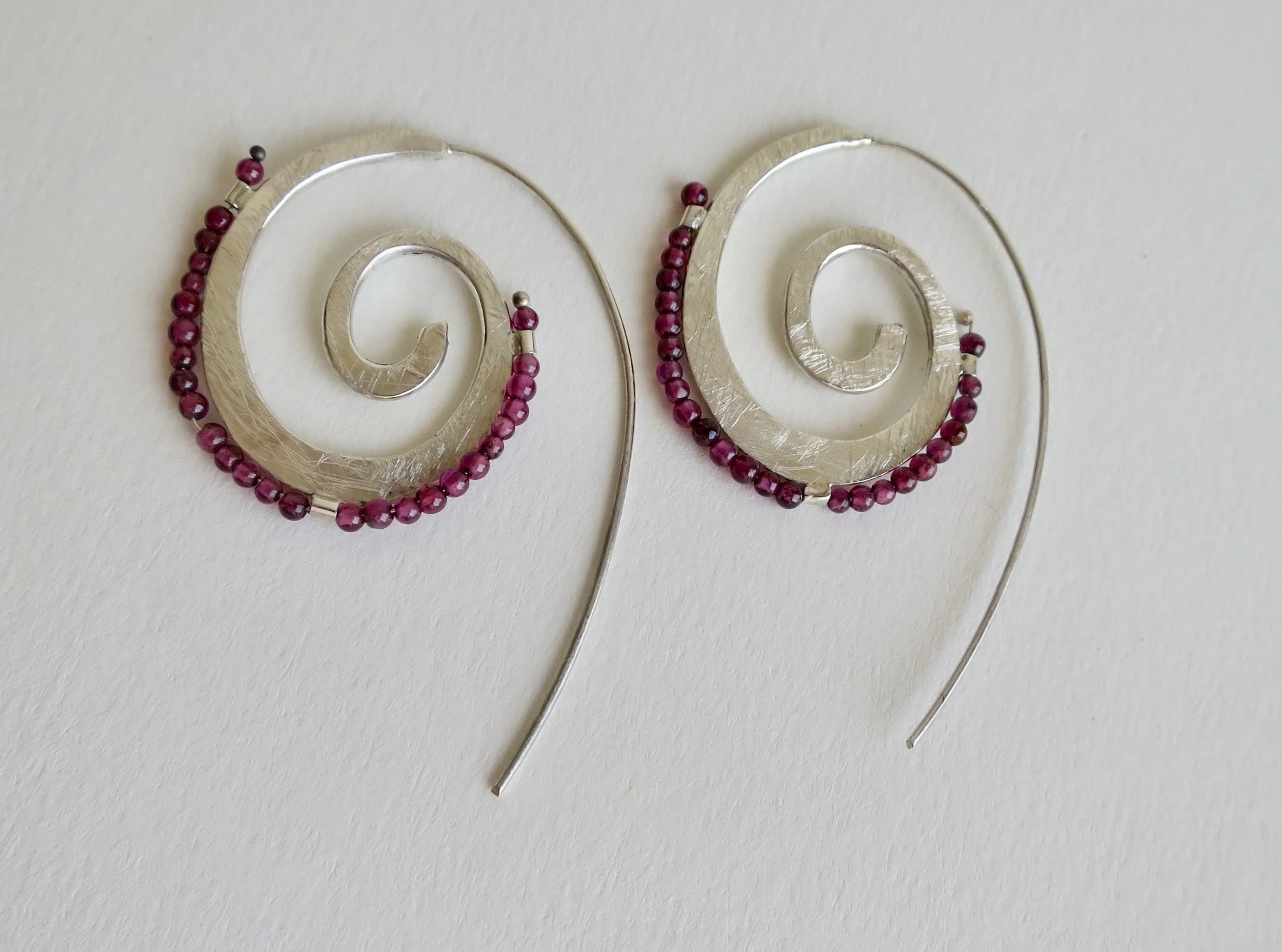 Sterling silver spiral earrings with Garnet