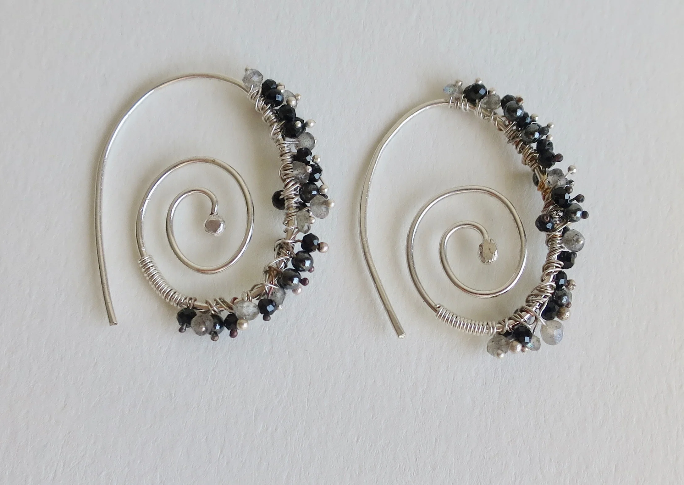 Silver spiral earrings with Labradorite and Spinel